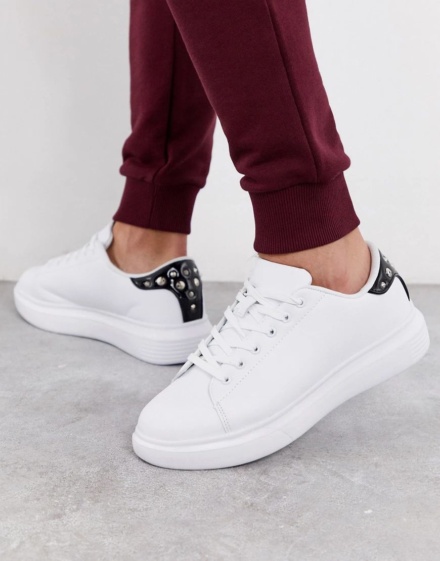 Truffle Collection chunky white sneaker with studded black tab | ASOS (Global)