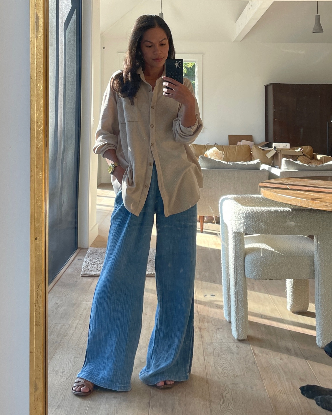 Wide leg “jeans” (they are actually super soft flowy pants not actual denim) note: they have a slit on both sides of the outer leg (look really cute with sandals or tall boots). I’m 5’4 for reference and got size small. Button down relaxed shirt. Relaxed fall look casual easy style 