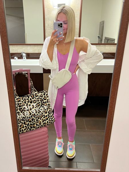 Workout onesie / full length bodysuit / lavender onesie / Chloe sneaker dupes / pink suitcase / pink luggage / airport outfit / spring airport outfit / travel style 

#LTKFind #LTKSeasonal #LTKtravel