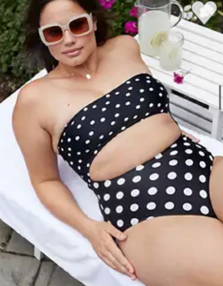 This strapless one piece swimsuit is so cute! You will love the polka dots and cute cutouts. Available in sizes up to 2XL and in long sizes too!

#LTKsalealert #LTKcurves #LTKunder50