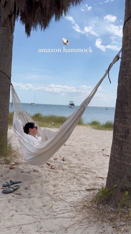 amazon hammock perfect for the beach, park or backyard! It can be tied between trees or something else sturdy or used on a hammock stand. 

Linked more amazon beach essentials too! 

hammock, beach find, summer find,  beach essentials 

#LTKVideo #LTKSeasonal #LTKHome