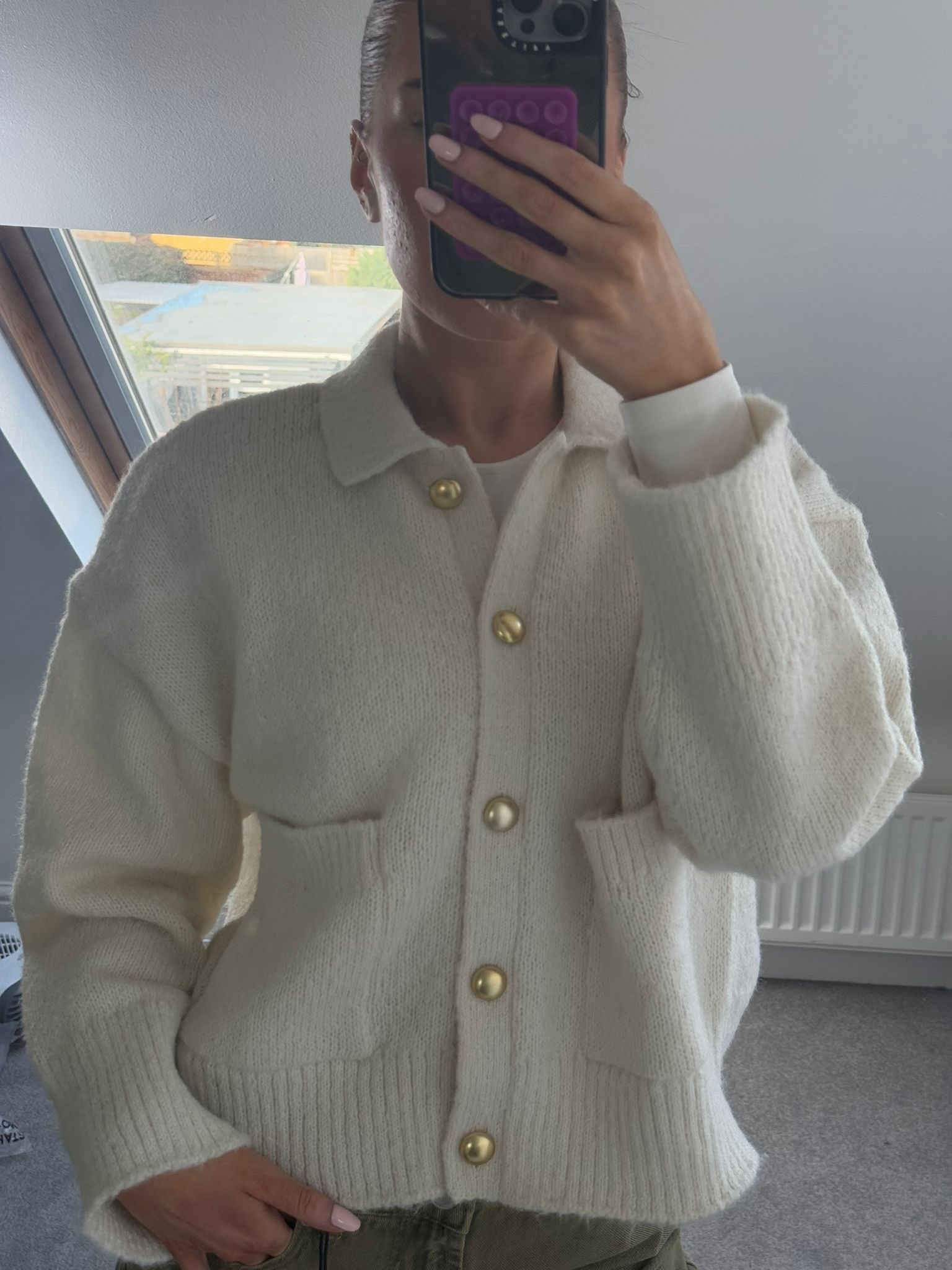 ASOS cream knit cardigan 

#LTKwinter #LTKeurope #LTKuk