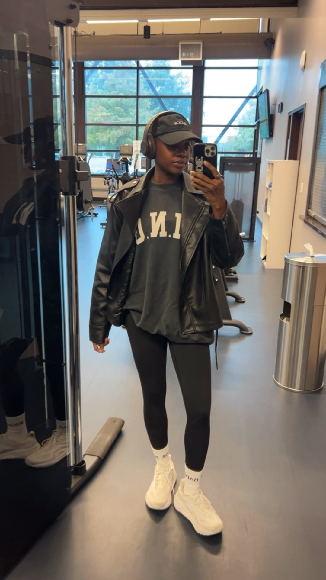 Winter gym outfit!! Black graphic dad hat, brown Beats by Dre, black Anine Bing sweatshirt, spanx sport bra and spanx leggings. I’m wearing a medium in in all pieces  

#LTKHoliday #LTKfitnessgoals #LTKTravel