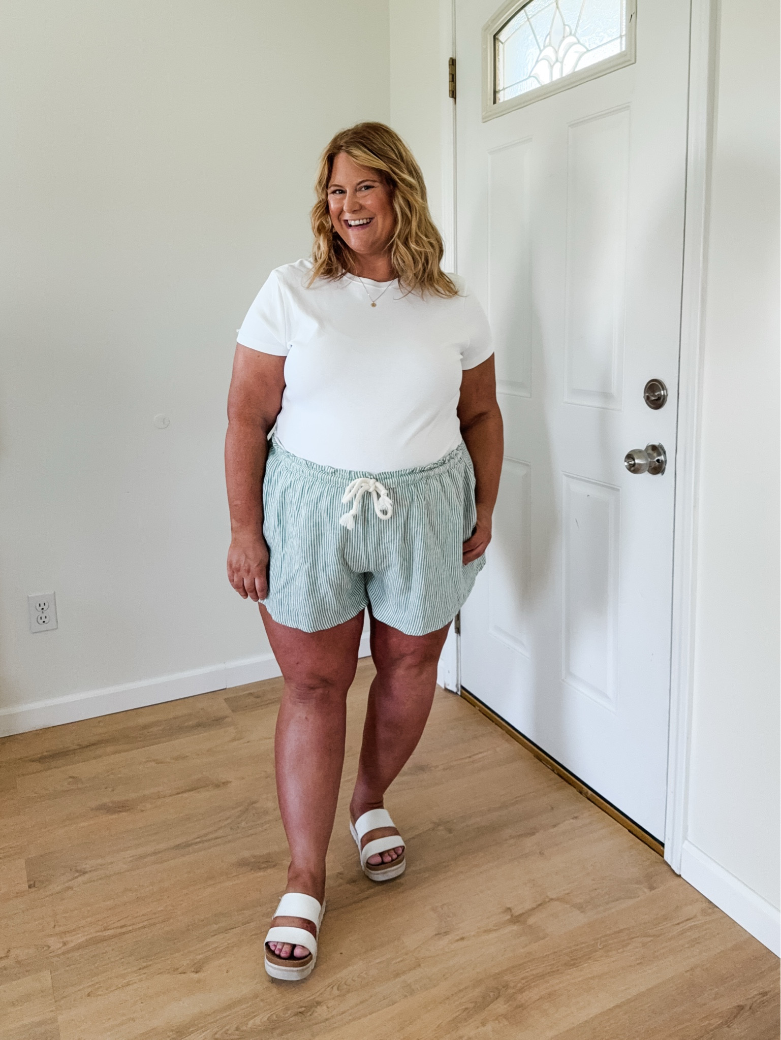 Wearing an XL in my tee and an XXL in my striped shorts (sized up for the bump).

#LTKBump #LTKMidsize #LTKSeasonal