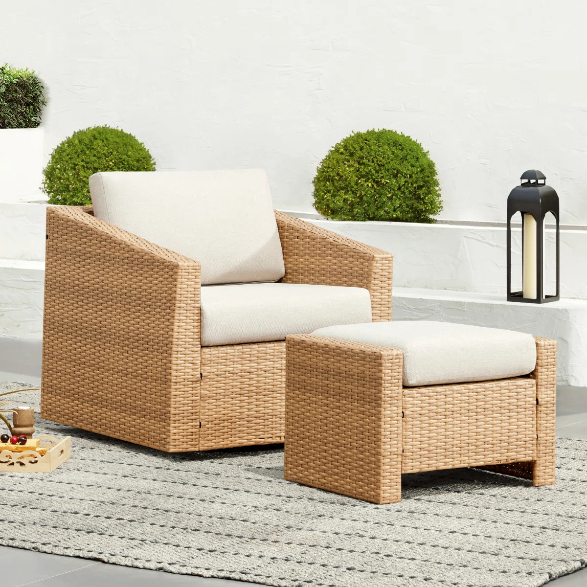 Tiaka Outdoor Swivel Rattan Single Patio Chair with Ottoman | Wayfair North America