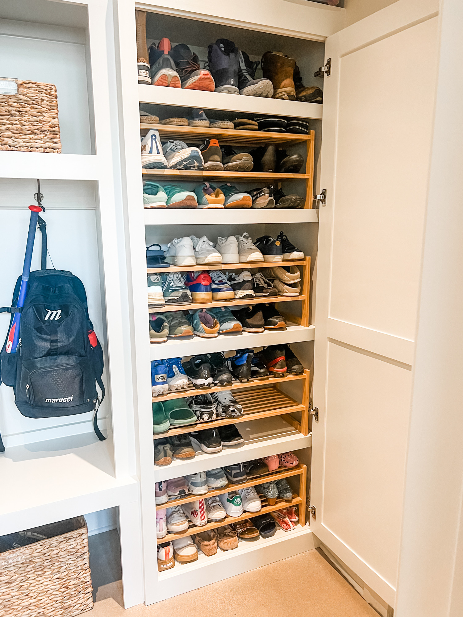 This mudroom is every parent's dream. We can make it happen in your space, but it'll be up to you to train your people to put their shoes back properly! 

We're loving this genius organizing hack to really make this closet functional though. Using these free-standing shoe shelves ON the shelves literally triples the amount of shoes that can be stored making a shoe-free home a reality! 

 