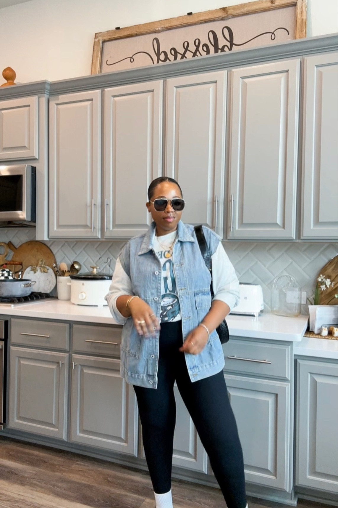 NFL sweatshirt - fall fashion - fall outfit - sweatshirt - denim - denim vest - fall - leggings - uggs - Ugg boots - fall handbag - everyday outfit - simple outfit - 

#LTKstyletip #LTKfindsunder50 #LTKmidsize