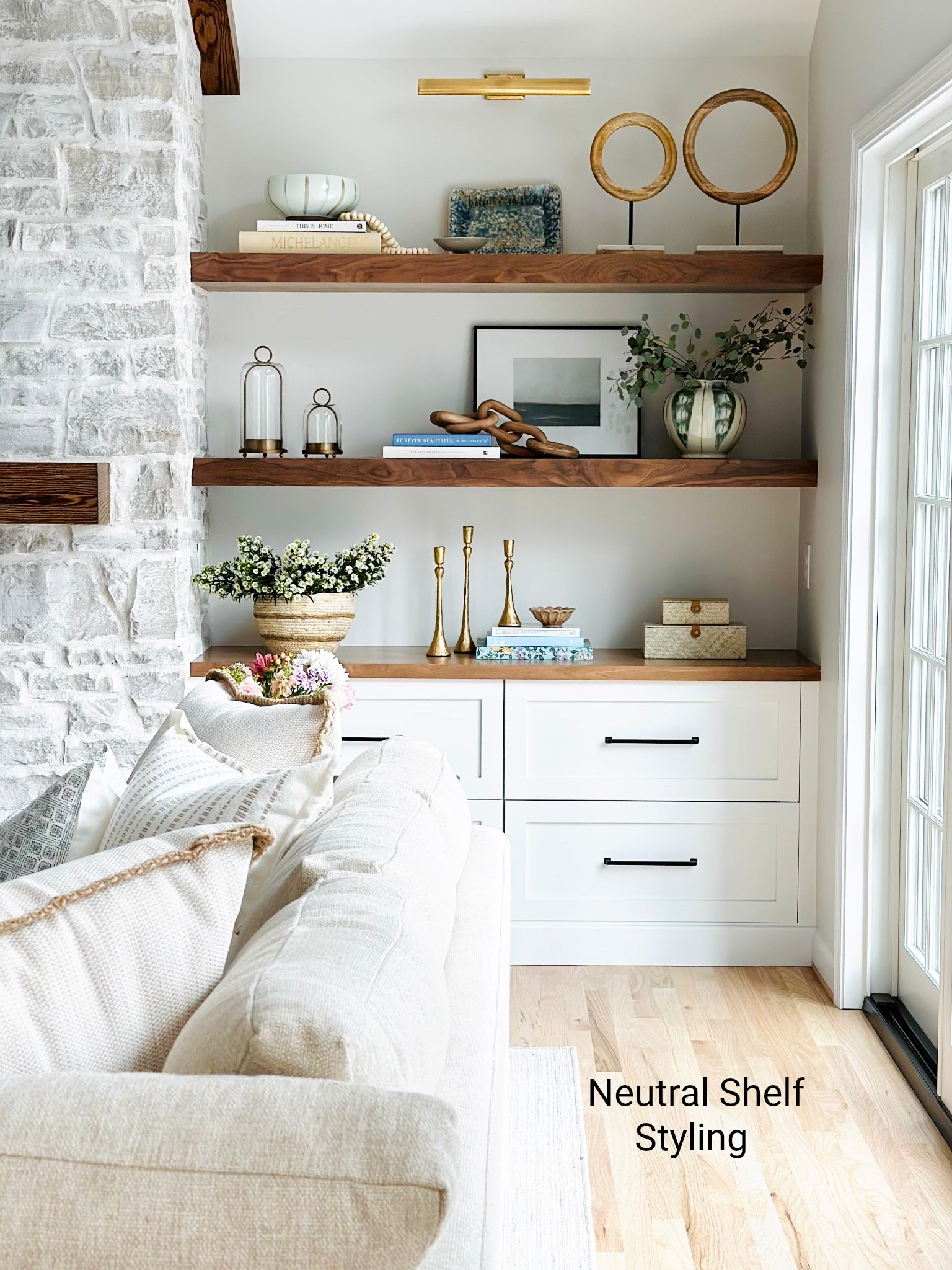 Shelf styling for large shelves. 
Shelf styling that has pops of color and texture while still remaining neutral. 

Art is called Calm Before the Storm- it’s on my website www.debpresutto.com (not linked here)

Shelf styling, shelf styling tips, styling builtins, shelf decor, styling family room builtins, fireplace styling 

#shelfdecor #shelfstyling #shelfstylingtips #amazon #amazonfinds #stylingbuiltins #homedecor #art #coffeetablestyling #stonefireplace #interiordecorating 

Styling & photography done by me. Room design by MBM Design Co.

#LTKStyleTip #LTKSeasonal #LTKHome