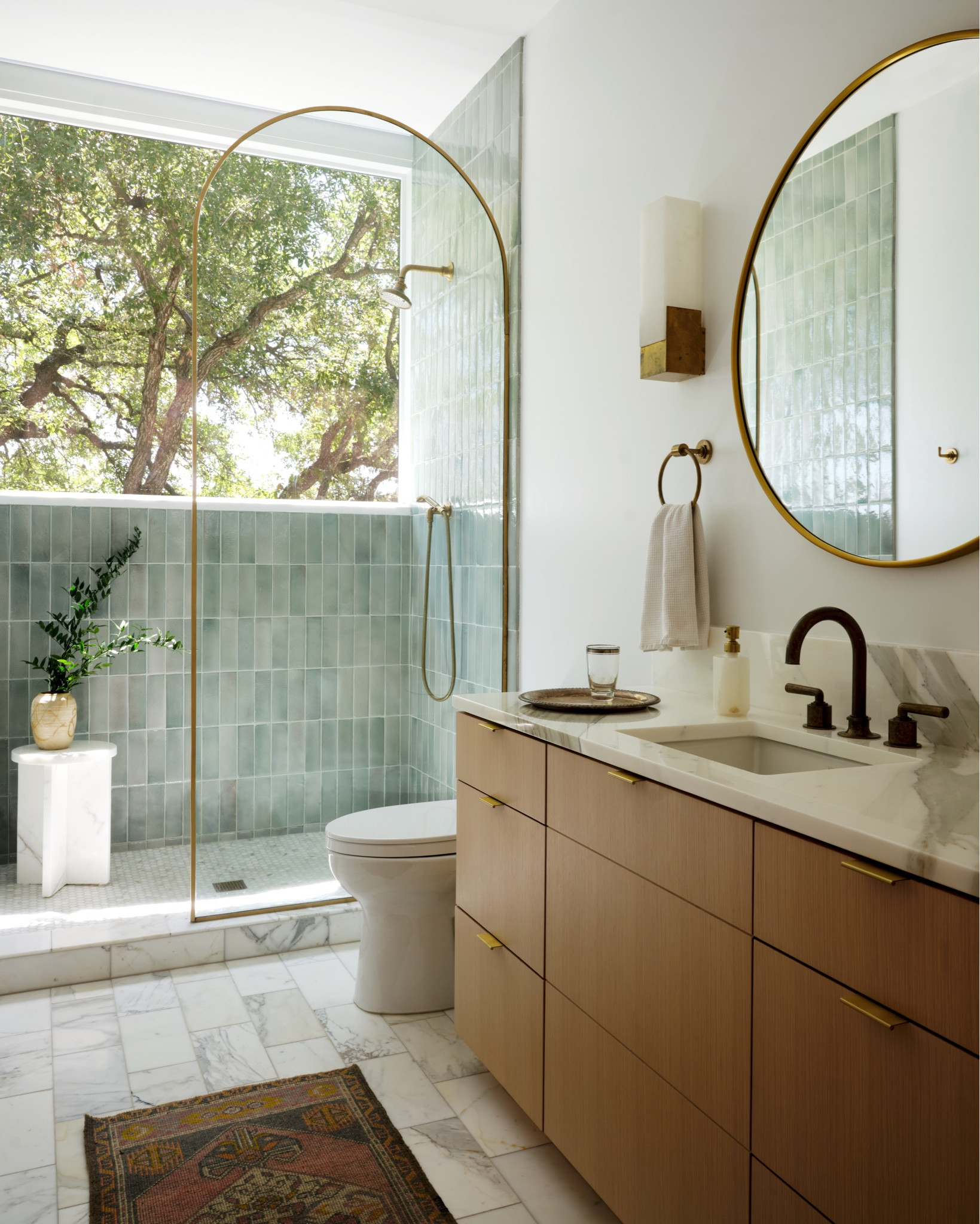 This little bathroom was such a fun puzzle. Since it is a guest bath as well as the daughter’s bath we wanted it to feel soft and feminine but still sophisticated. 

#LTKhome