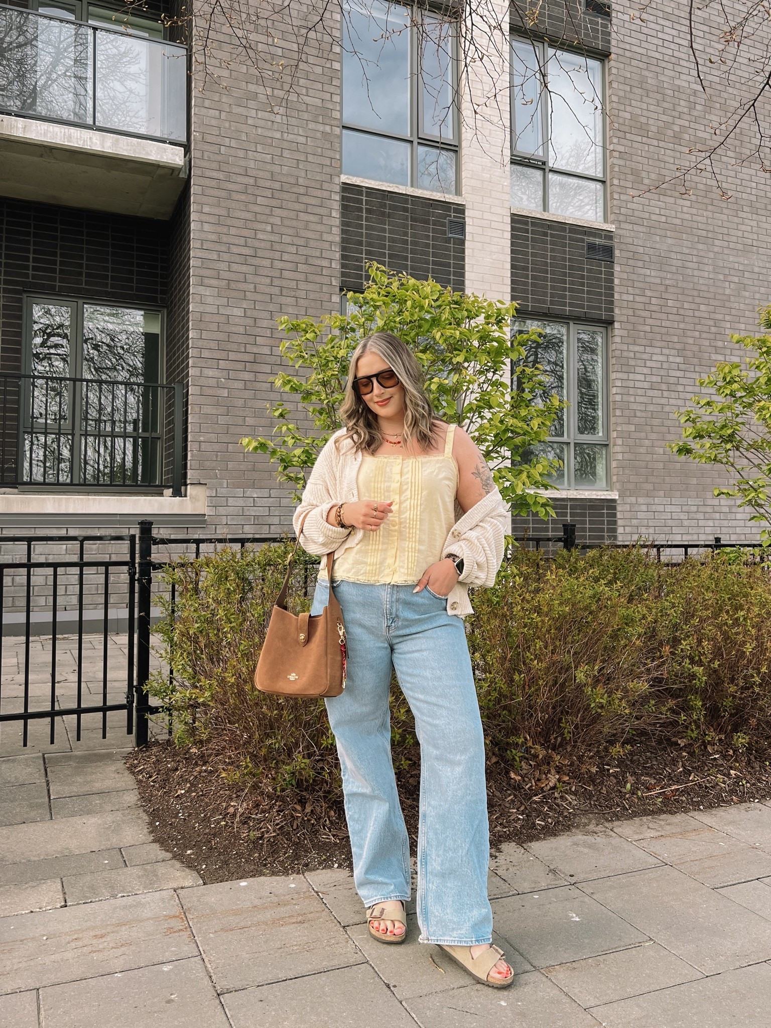Casual spring outfit! Wearing my usual L in the butter yellow tank top (Canadian link under “similar products”). Wearing 32 in my Abercrombie jeans for a looser fit. Cardigan is old but I linked an almost identical one! Birkenstock sandals fit TTS

#LTKsale #LTKmidsize #LTKjeans
