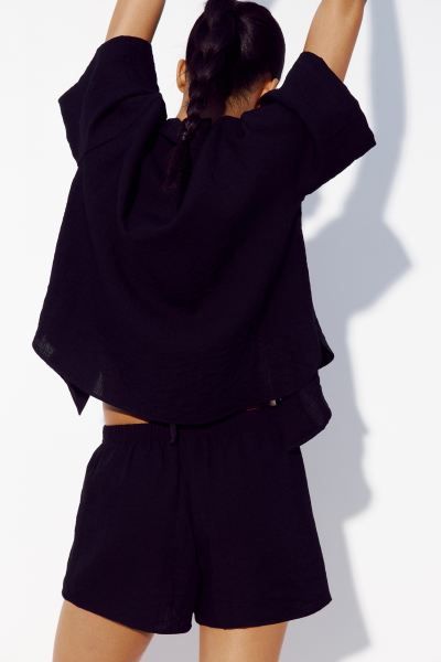 Beach Shorts with Eyelet Embroidery - Regular waist - Short - Black - Ladies | H&M US | H&M (US + CA)