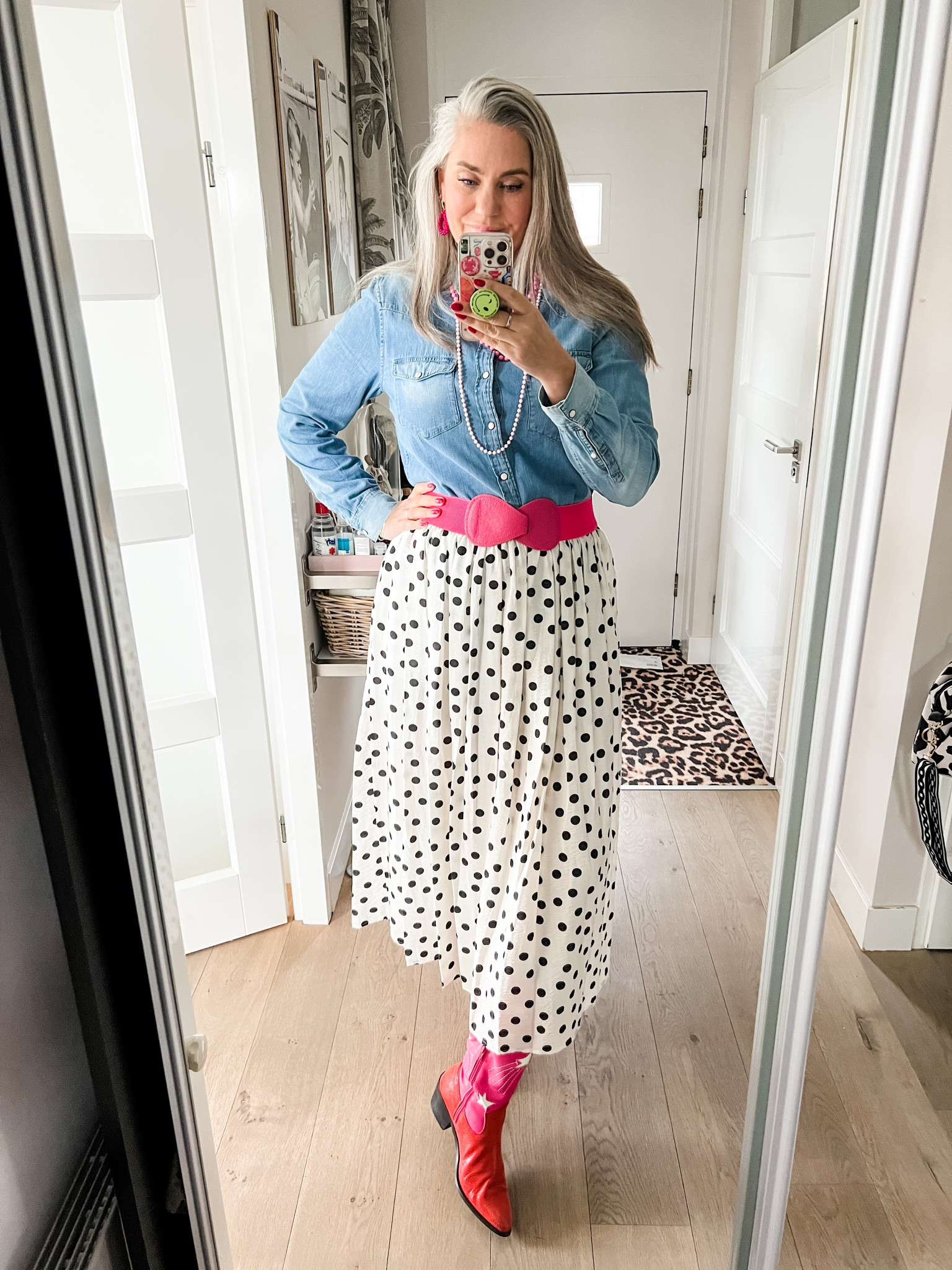 Ootd - Friday. A denim shirt (men’s thrifted), layered necklaces (thrifted), pink elastic belt, polka dot midi skirt (Primark), pink and red cowboy boots (old, DW/RS x Ramijntje), pink earrings. 



#LTKspring #LTKnederlands #LTKeurope