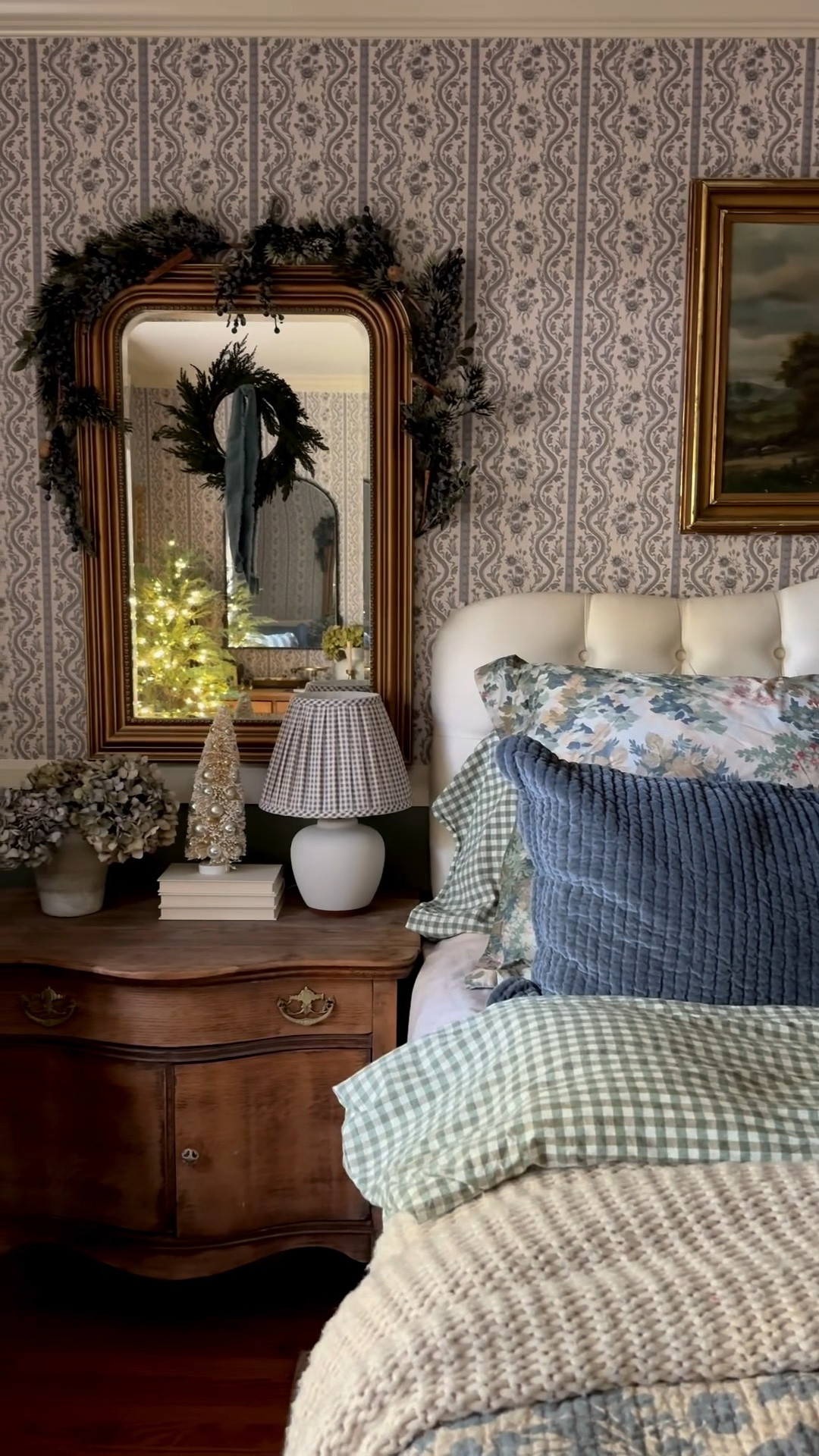 The frosted berry garland that I hang on my bedside mirrors is currently on clearance. I’ve had mine for 4 seasons now and love them. They have frosted blueberry, walnut, and cinnamon stick detailing. Also, linking my other bedroom items seen here including the blue floral reversible quilt from @potterybarn

#LTKHoliday #LTKSaleAlert #LTKHome