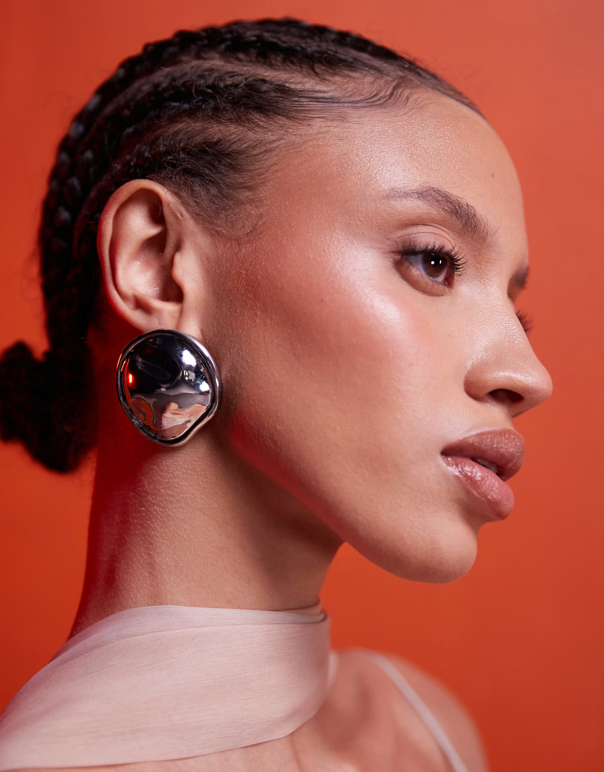 ASOS DESIGN oversized stud earrings with molten circle detail in silver tone | ASOS (Global)