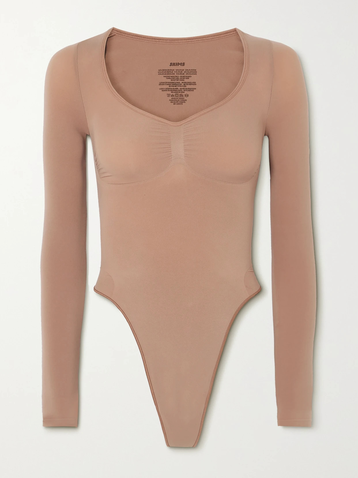 SKIMS - Seamless Sculpt Long Sleeve Thong Bodysuit - Sienna | NET-A-PORTER (US)