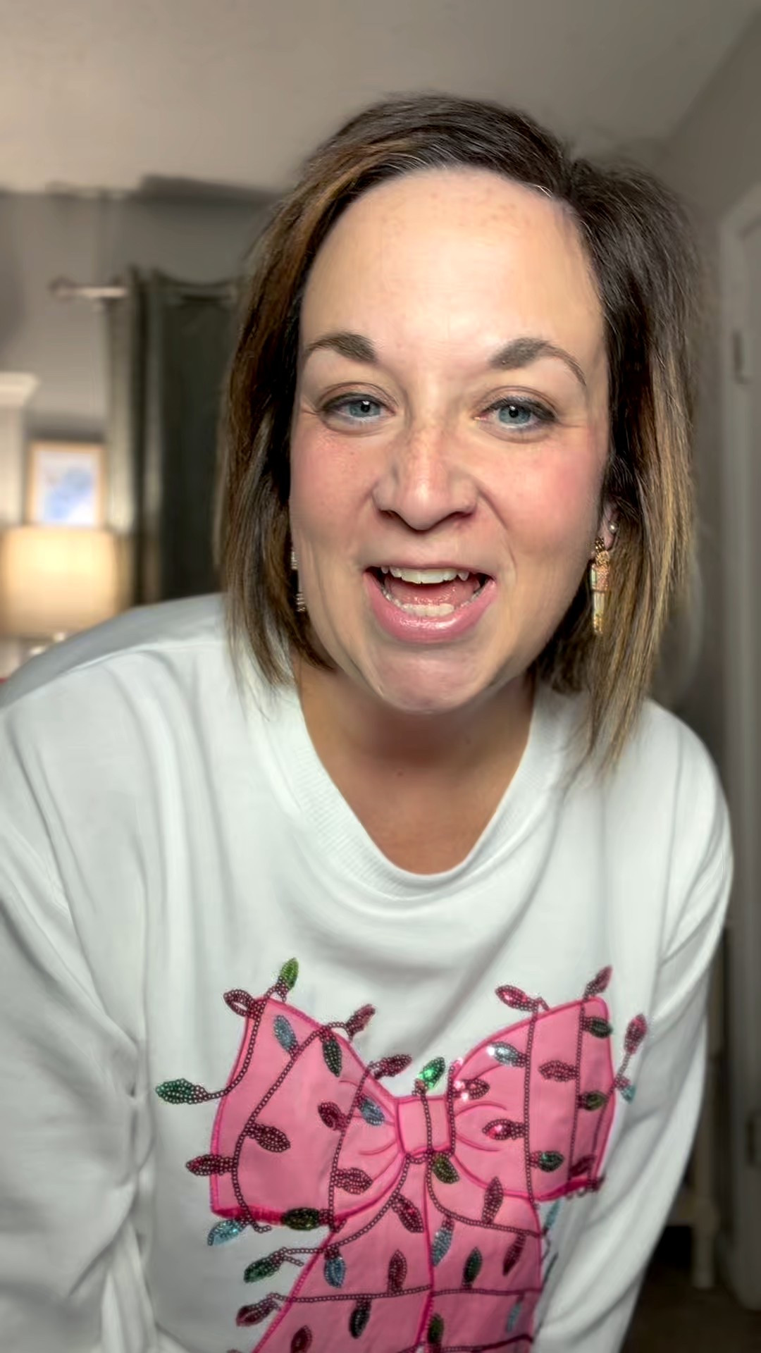 I LOVE this bow sweatshirt! This does run true to size. 

#LTKHoliday #LTKOver40 #LTKootd