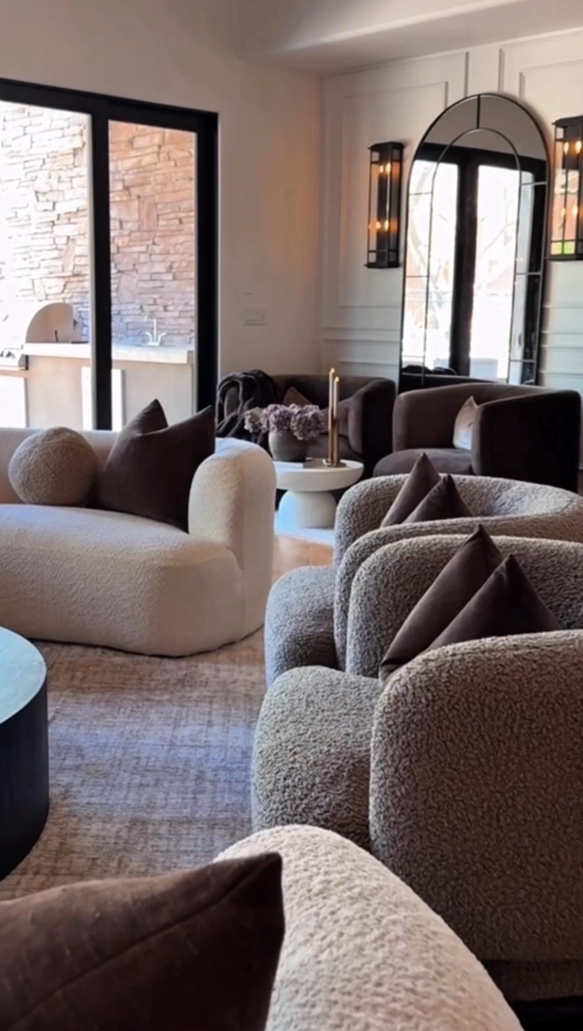 The curved boucle chairs and rich brown accents make this living room feel so warm and inviting. Soft textures and rounded silhouettes add the perfect cozy touch to a modern, neutral home 🤎


#livingroominspo #neutralhome #cozyinteriors #moderndecor #bouclechairs #warmminimalism #homedesign #interiorstyle #decorgoals 

Summerthompsonstyles




#LTKHome #LTKSaleAlert