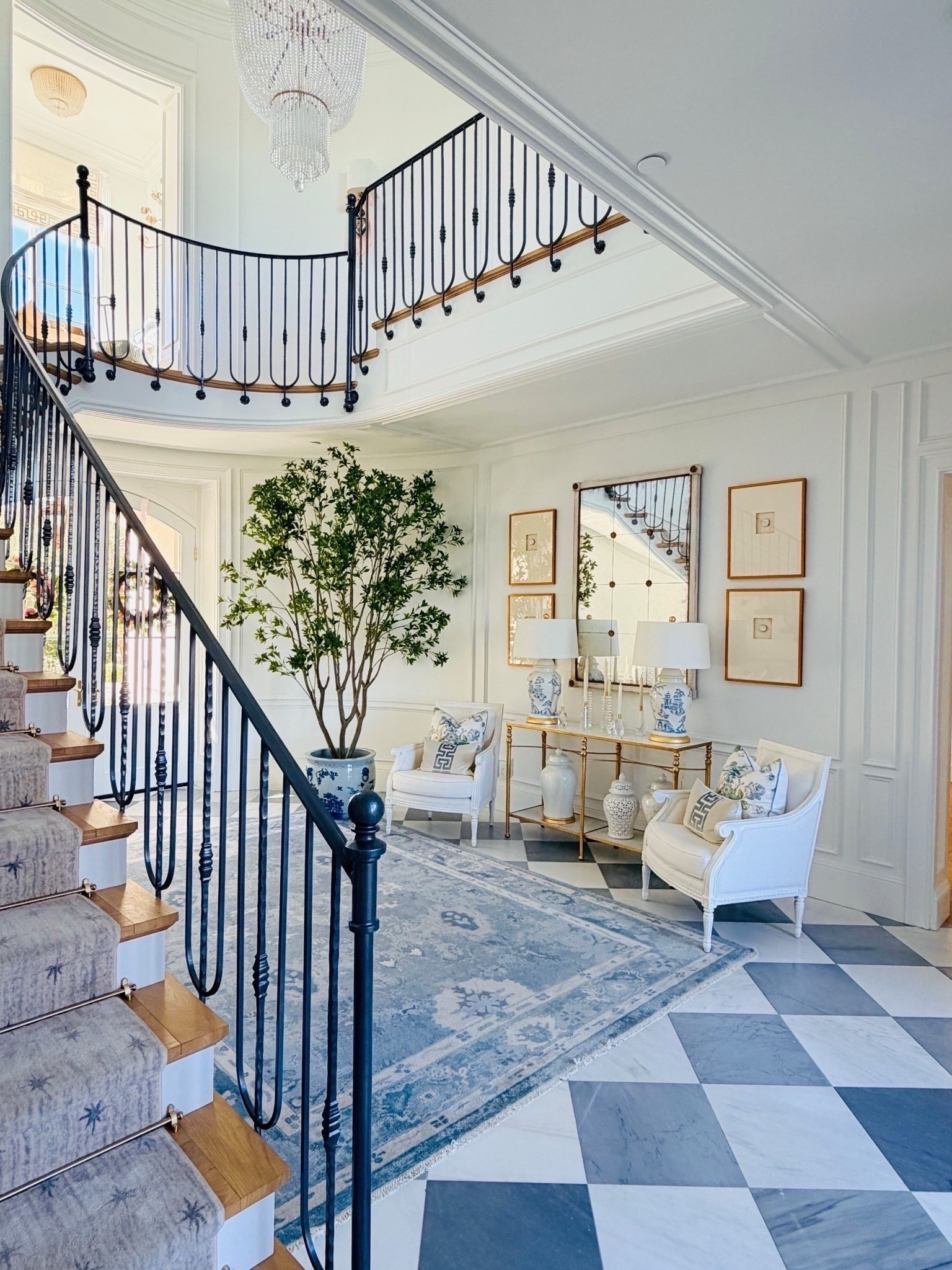 The most gorgeous faux tree! It is 9.5’ tall (there is an 8’ option as well) and looks so real! We placed our’s inside this beautiful chinoiserie planter (the largest size).

#LTKHome