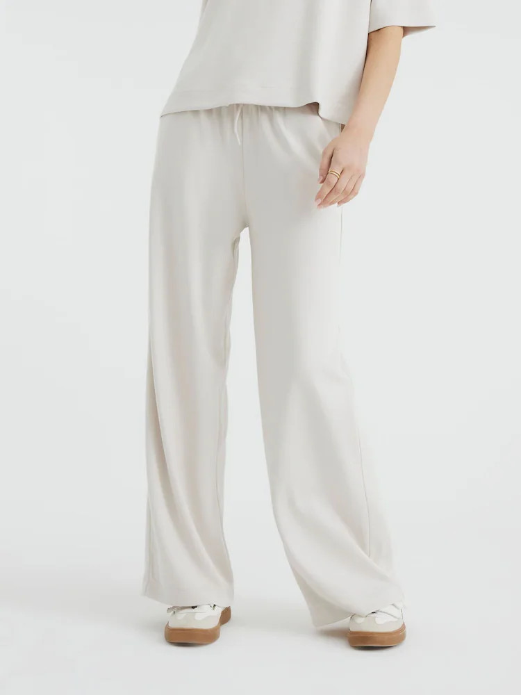 Buy River Island Cream Premium Swash Wide Leg Joggers from Next Belgium | Next EU