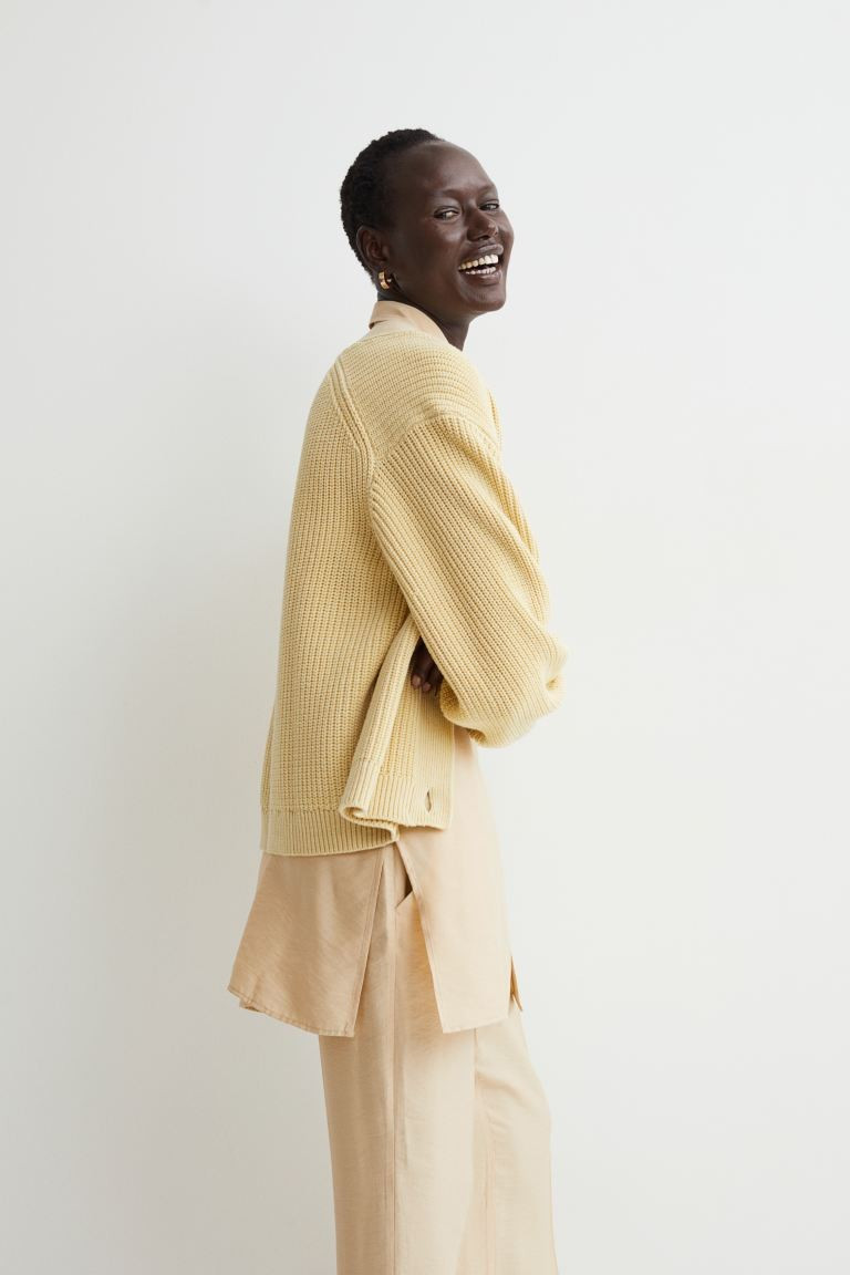 Boxy, rib-knit cardigan in a soft cotton blend. V-neck and buttons at front. Dropped shoulders wi... | H&M (US + CA)