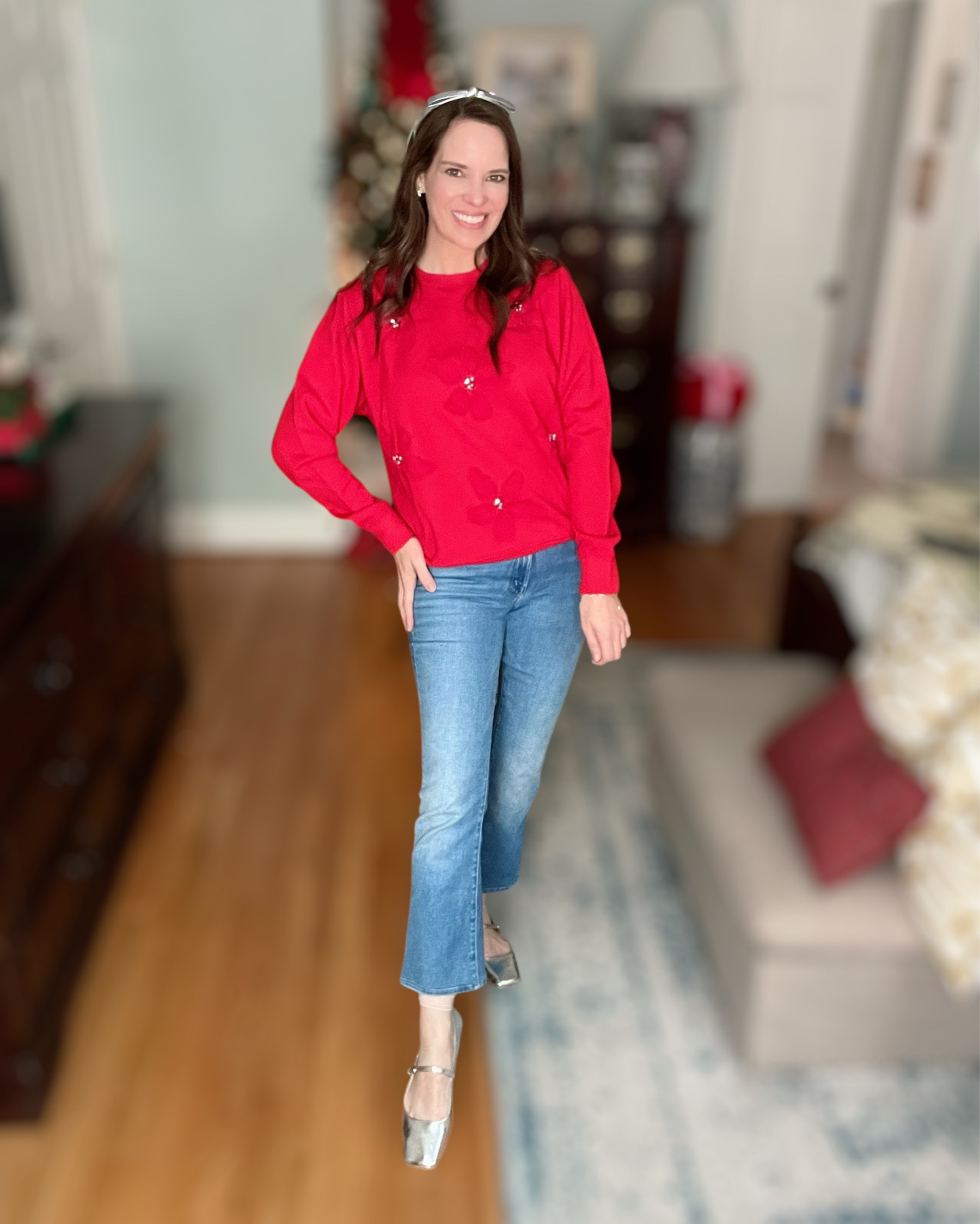 Red Bow Sweatshirt & Classic Denim 🎀✨

A cozy + festive casual Christmas look! This red Lilly Pulitzer sweatshirt has the prettiest stitched bow details with little pearls — so simple but so special for the season. Paired it with my favorite cropped denim and silver Mary Jane flats for a comfy, cute holiday outfit you can wear anywhere. My headband is Lele Sadoughi, but I linked a very similar silver bow version that gives the same sparkle ✨🎁

Perfect for school programs, holiday errands, cookie baking, or just feeling merry all day long ❤️🎄 Everything is linked!

red holiday sweatshirt, lilly pulitzer christmas, casual holiday outfit, silver mary janes, bow headband dupe, festive winter look, comfy christmas style, merry & bright outfit, holiday casual denim look, mother jeans, mother denim, petite jeans

#LTKHoliday #LTKGiftGuide #LTKPetite