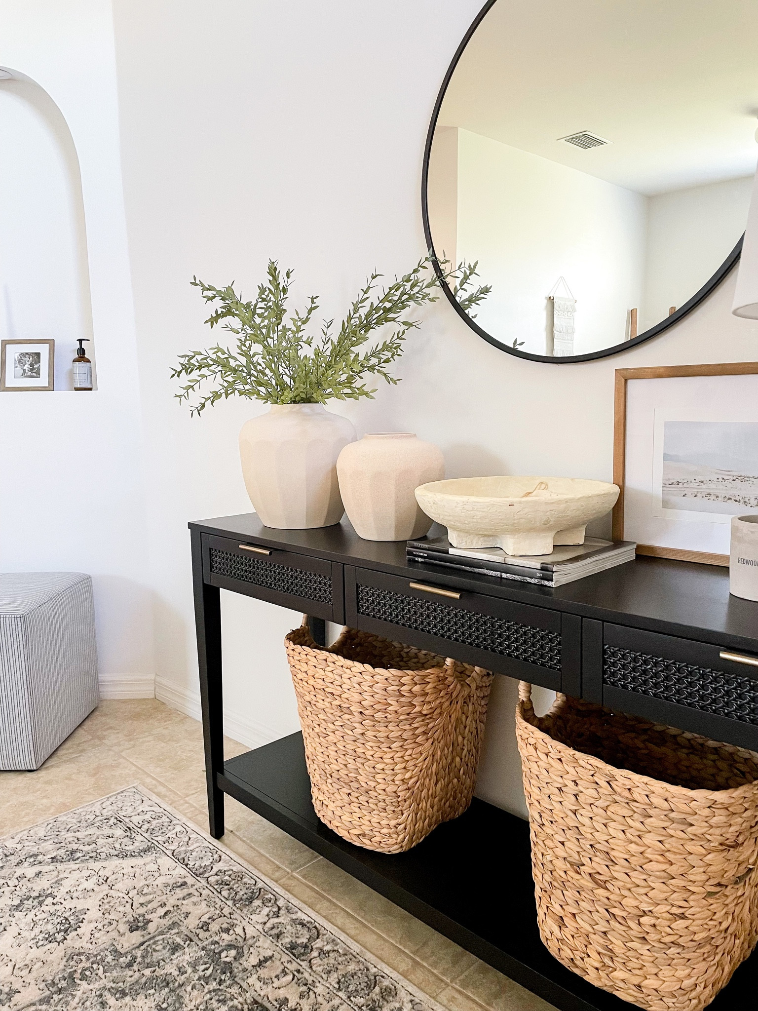 Entryway details.



Modern transitional home. Studio McGee. Black console table. Entryways table decor. Entryway runner. Cube ottoman. Storage baskets. Black round mirror. Target home. Amazon. Walmart.


#LTKunder100 #LTKhome #LTKunder50