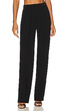 Norma Kamali Tapered Pleated Trouser in Black from Revolve.com | Revolve Clothing (Global)