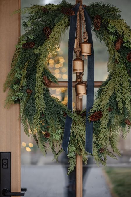 Shop my front porch wreaths! I’ve linked everything I used, including how I hung them! 

Use code LINDSEYP10 for 10% off $100+ at McGee & Co. 

Holiday entry, Christmas entry, holiday front porch, wreath, studio McGee, bells, brass bells, ribbon, velvet, command hooks, wreath hanger , planter, pot, cedar, amazon home, Amazon finds, Christmas, holiday 