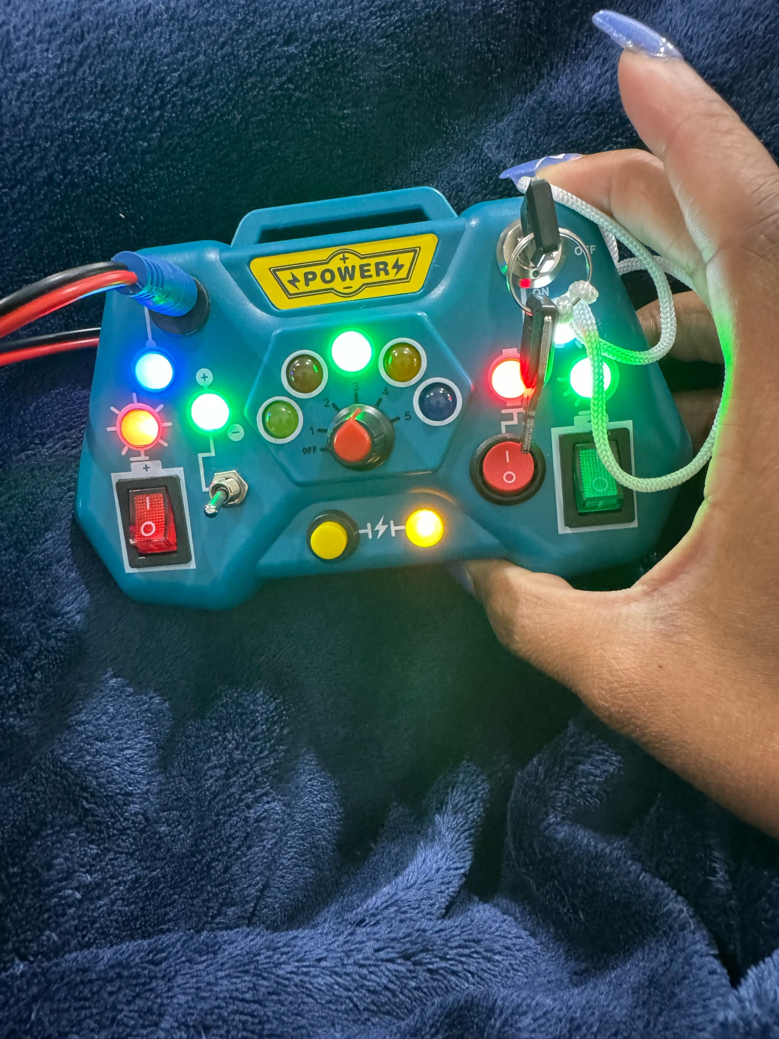 Love this battery operated toy for toddlers on the go! Especially the curious ones! 

This toy allows your child to push buttons, flip switches and turn keys! Great for a travel toy or for car rides! 

#LTKFindsUnder50 #LTKGiftGuide #LTKFamily