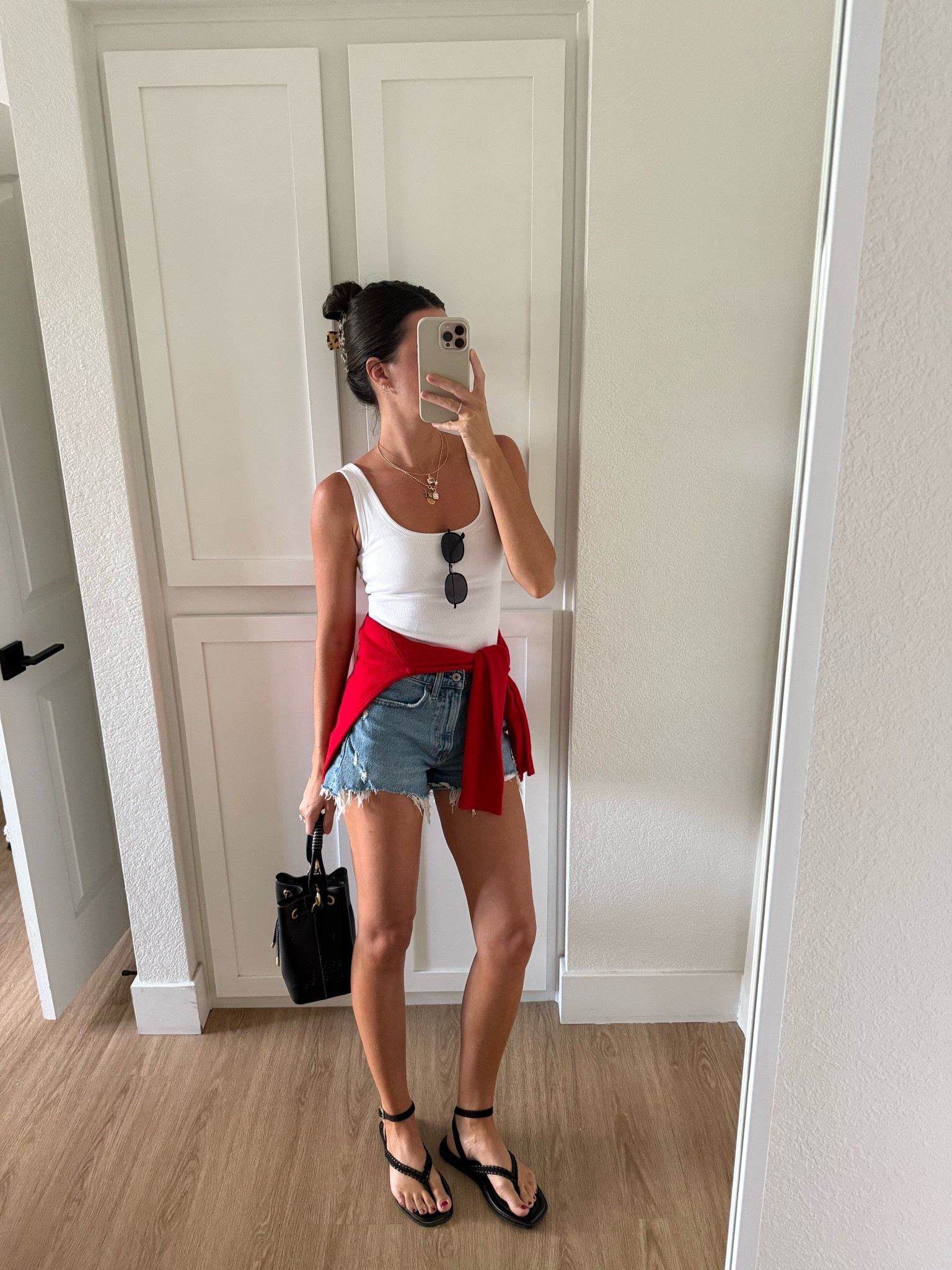 I’m wearing XS in the tank, small in sweater, 25 in shorts!