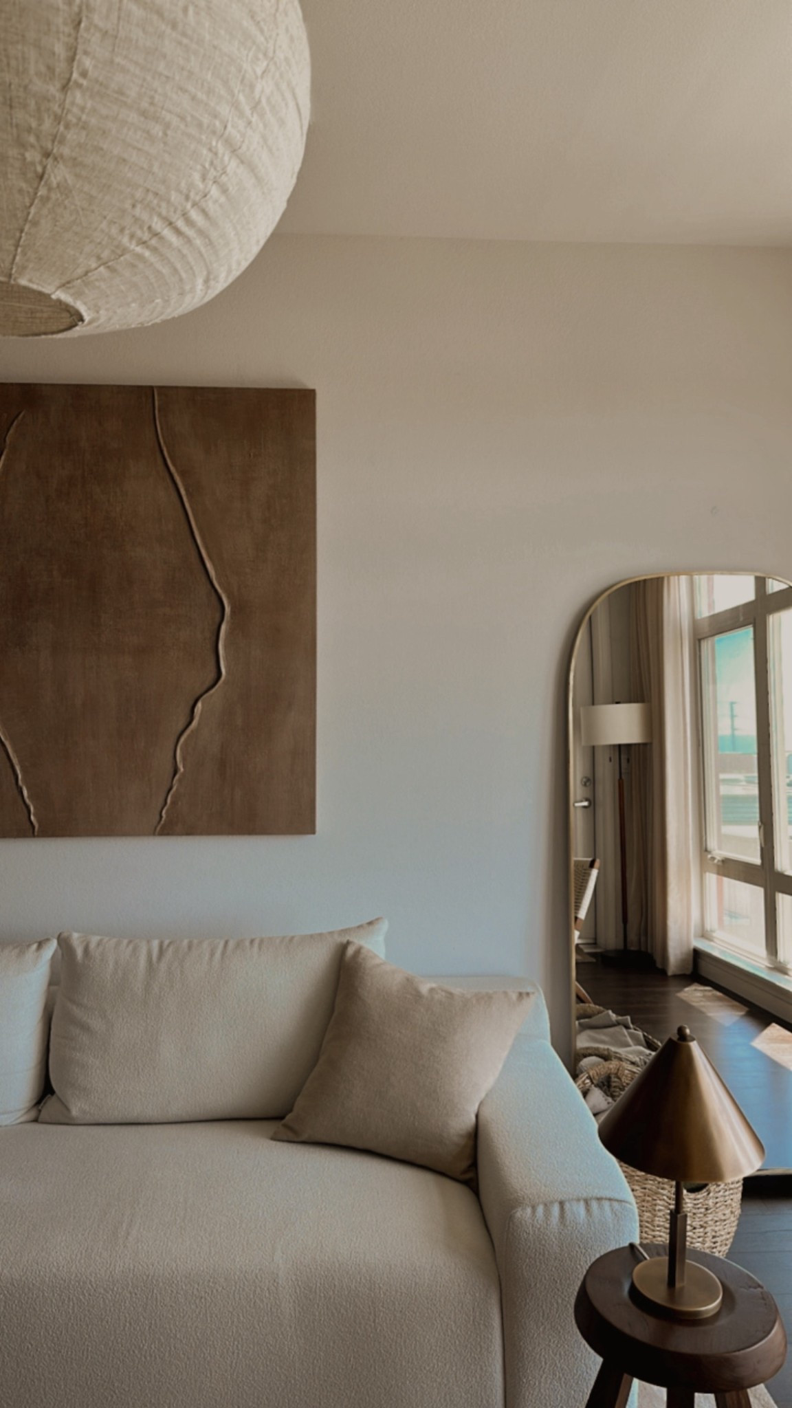 Living room view 
Mirror - Ethnik Living) linked a similar one)
Wall art - Meson Art
Linen Lamp Shade- Zara Home

Boucle sofa, beige pillow cover, lamp, wooden stool, floor lamp, sheer curtains, throw basket, brass lamp, woven accent chair - linked

#LTKHome #LTKSeasonal #LTKStyleTip