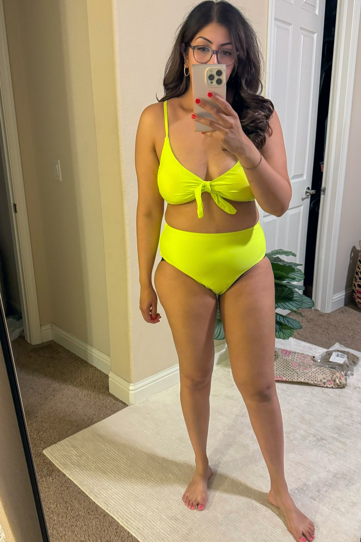 I would highly recommend this two piece swimsuit from Amazon for the those of us moms who are conscious about the lower belly area. Bottoms give coverage on the rear and are high enough to cover stretch marks or C-section scars. Bra is adjustable. For reference I am in-between a size 10 and 12 bra size 36D. 
Wearing a large 

Amazon swimsuit try on / size 12 swimsuit / mom pooch friendly swimwear / high waisted swimsuit
/ Amazon swimwear / beach vacation / Hawaiian vacation / neon green swimsuit 

#LTKMidsize #LTKSeasonal #LTKTravel