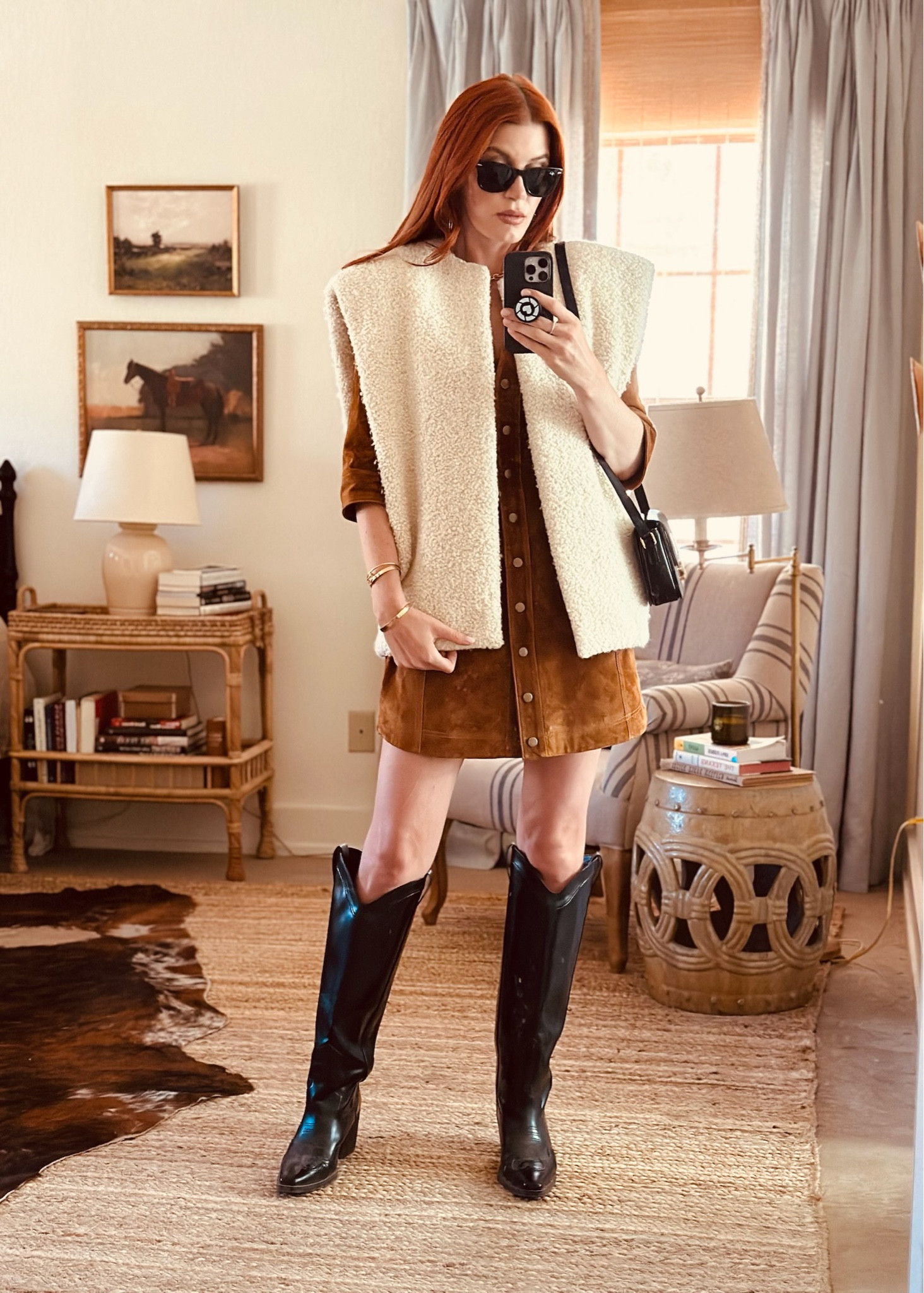 I mixed these luxe textures for an elevated fall look. I started with this buttery soft suede dress from Hunter Bell as my base layer and added a statement vest for some warmth. I finished it off with my glossy black boots and bag - such a classic and chic look with a modern edge.

#LTKHoliday #LTKItBag #LTKSeasonal