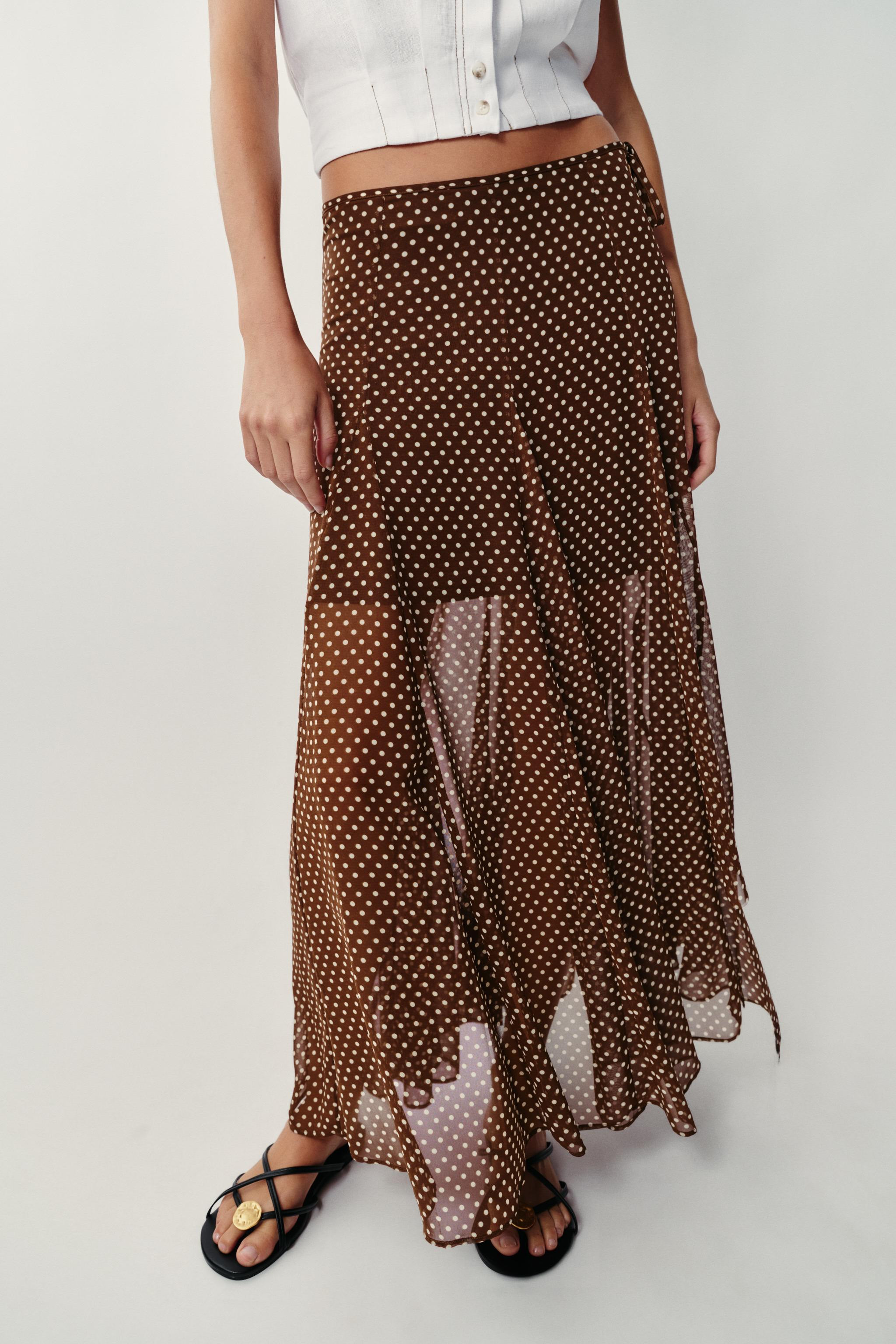 Skirt with short interior lining and side bow with beads. A-line hem. Hidden in-seam zip closure. | Zara US