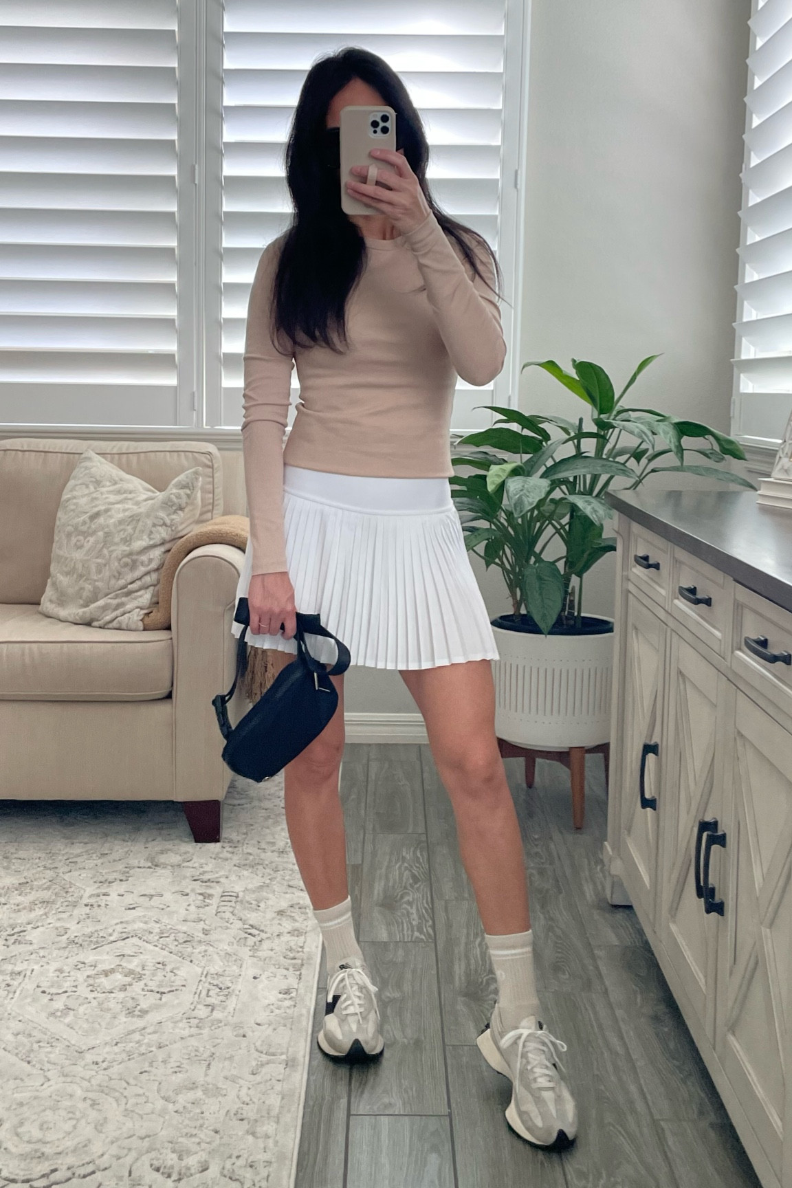 I’ve been living in this skirt and it’s 30% off!!! Such a great way to feel an elevated style while dropping kids off at school, running errands, and so much more! So fun comfy I will wear with sweaters, jackets, t shirts anything it’s so versatile! Such a perfect tennis skirt. 
I’m wearing a small for the top, and XS in the skirt. It’s such a great stretch and flow and I love the high waisted detail. I’m 5’3. 
Definitely a must buy! 

#LTKStyleTip #LTKCyberWeek #LTKSaleAlert
