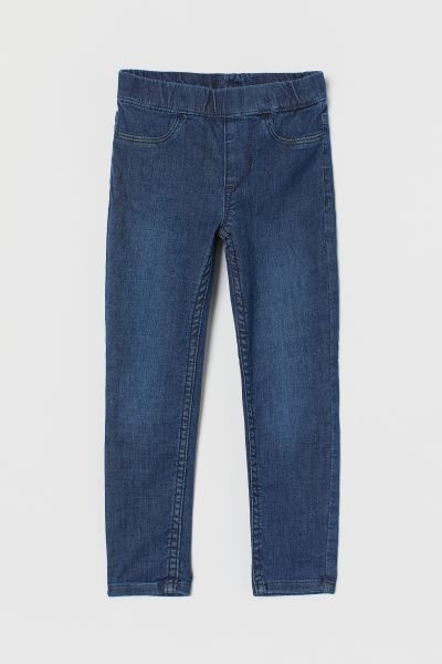 Leggings in washed stretch denim with an elasticized waistband, mock front pockets, and regular b... | H&M (US + CA)