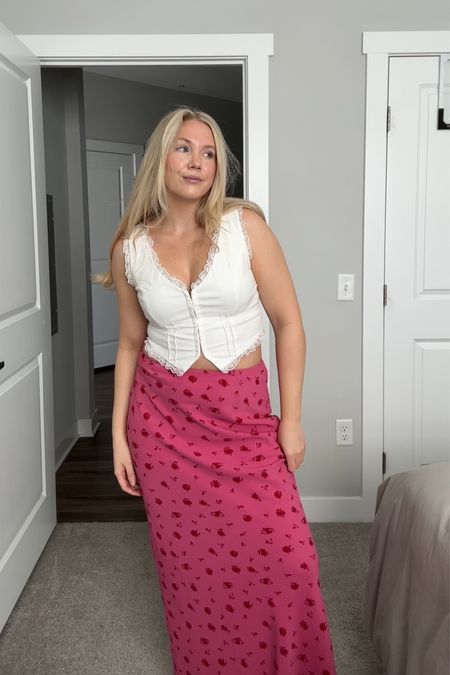 Spring break vacation outfit idea with this pink floral skirt and white top. Wearing a size 8 in both top and bottom. Normally a 6 and could’ve gone with my normal sizing #vacationoutfit #springbreakoutfit 

#LTKstyletip #LTKtravel #LTKSeasonal