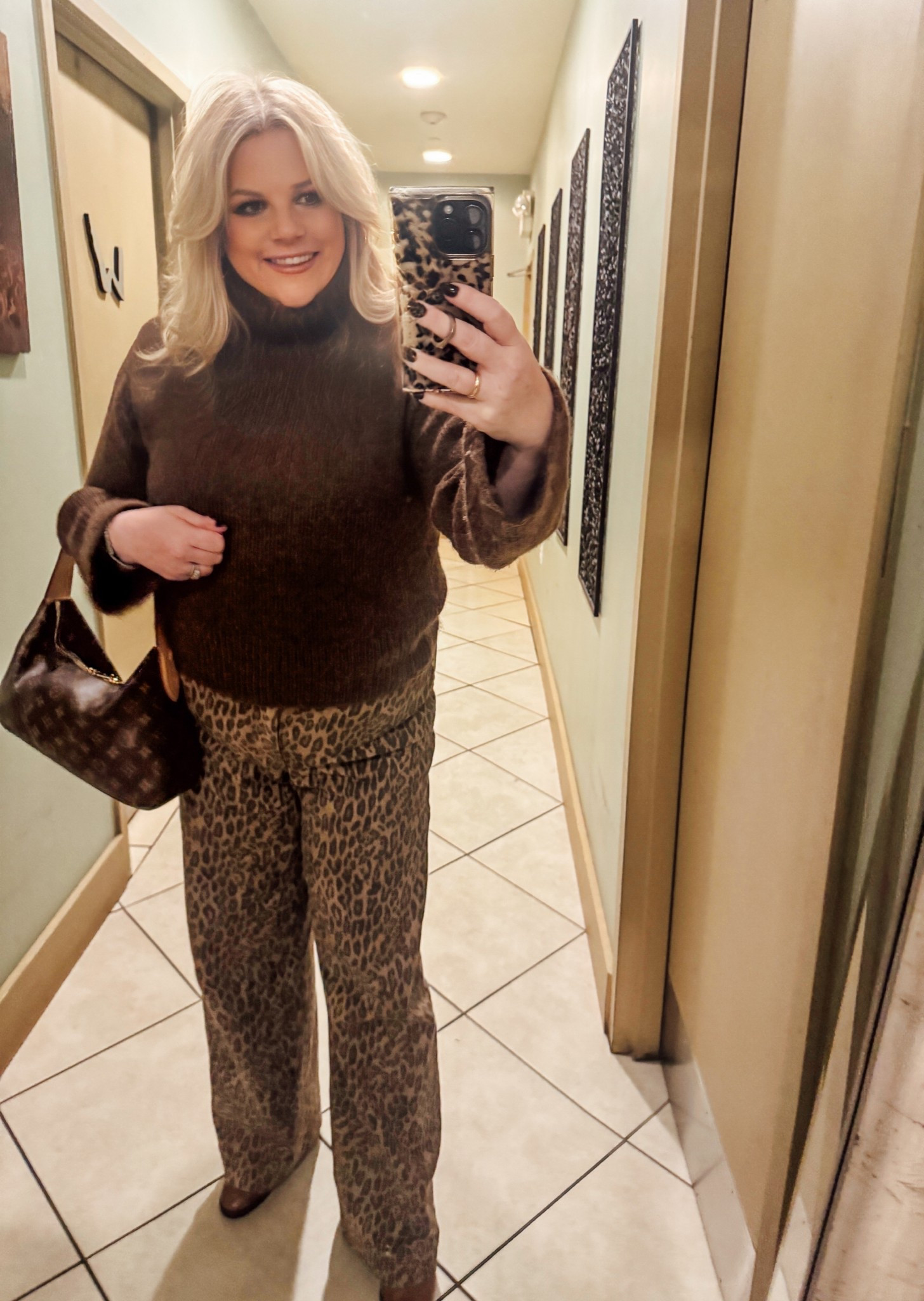 I'm loving that coco brown is THE color of the season.
This turtle neck sweater is so cozy and warm. Styled here with animal/leopard jeans, this also pairs well with white denim or black pants.

Fall outfit, Thanksgiving outfits, date night outfit, boots , sweaters

#LTKMidsize #LTKFindsUnder100 #LTKSeasonal