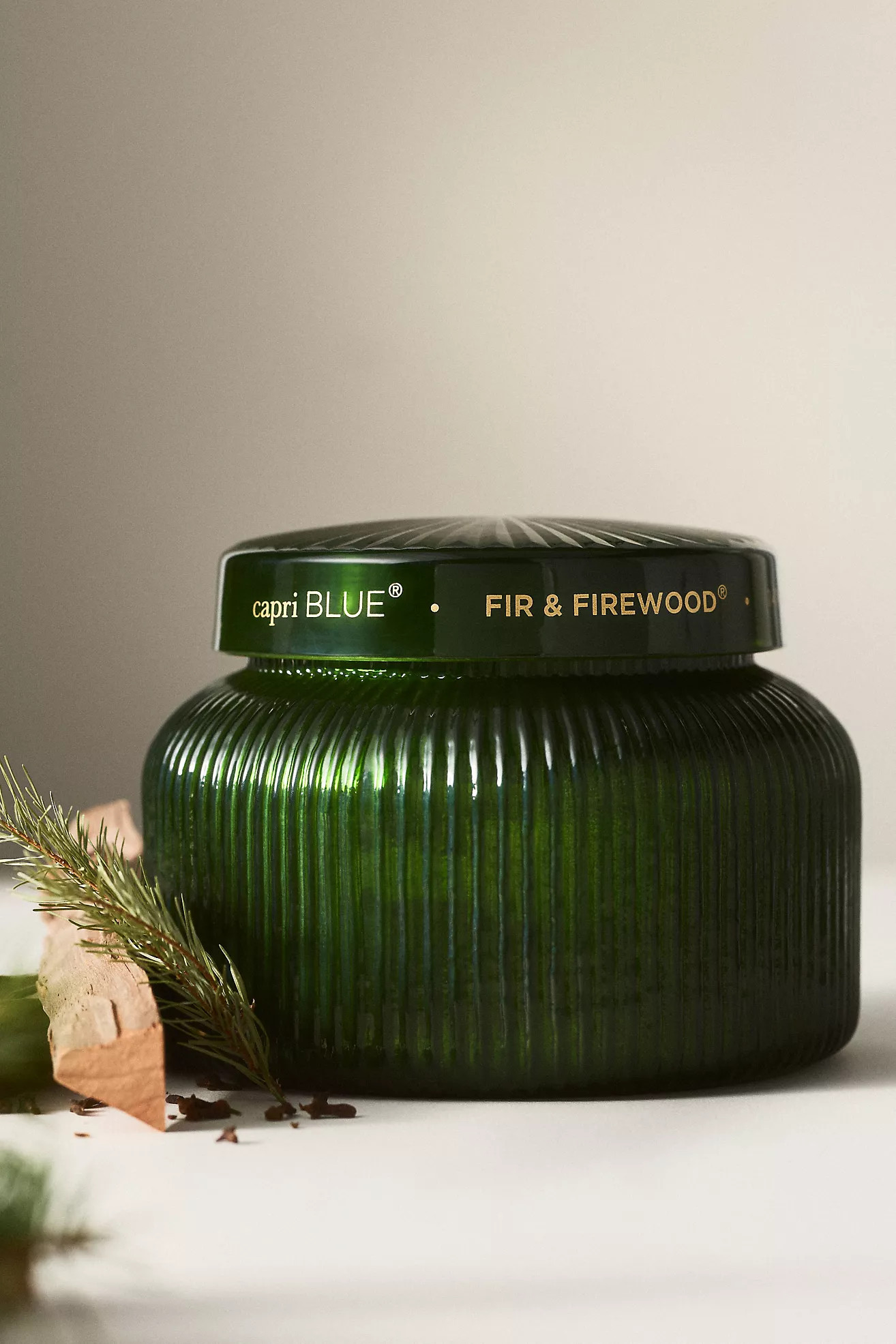 Capri Blue Woody Fir & Firewood Glass Candle | Anthropologie (US)