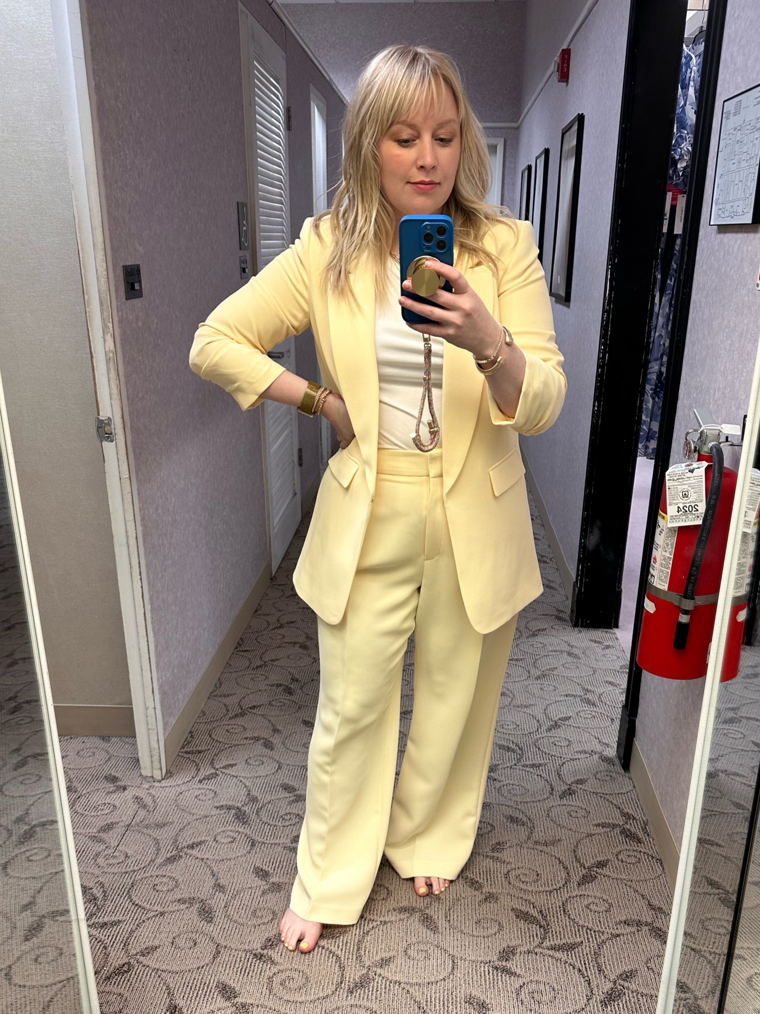 Yellow is the color of the season. Wearing a 8 in the jacket and 12 in the pants  