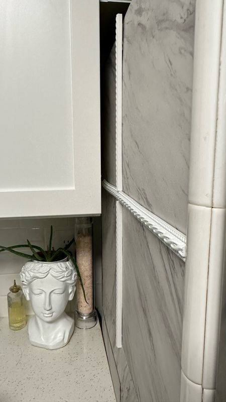 Grecian bust 
Modern kitchen 
Kitchen marble 

#LTKhome #LTKGiftGuide #LTKfamily