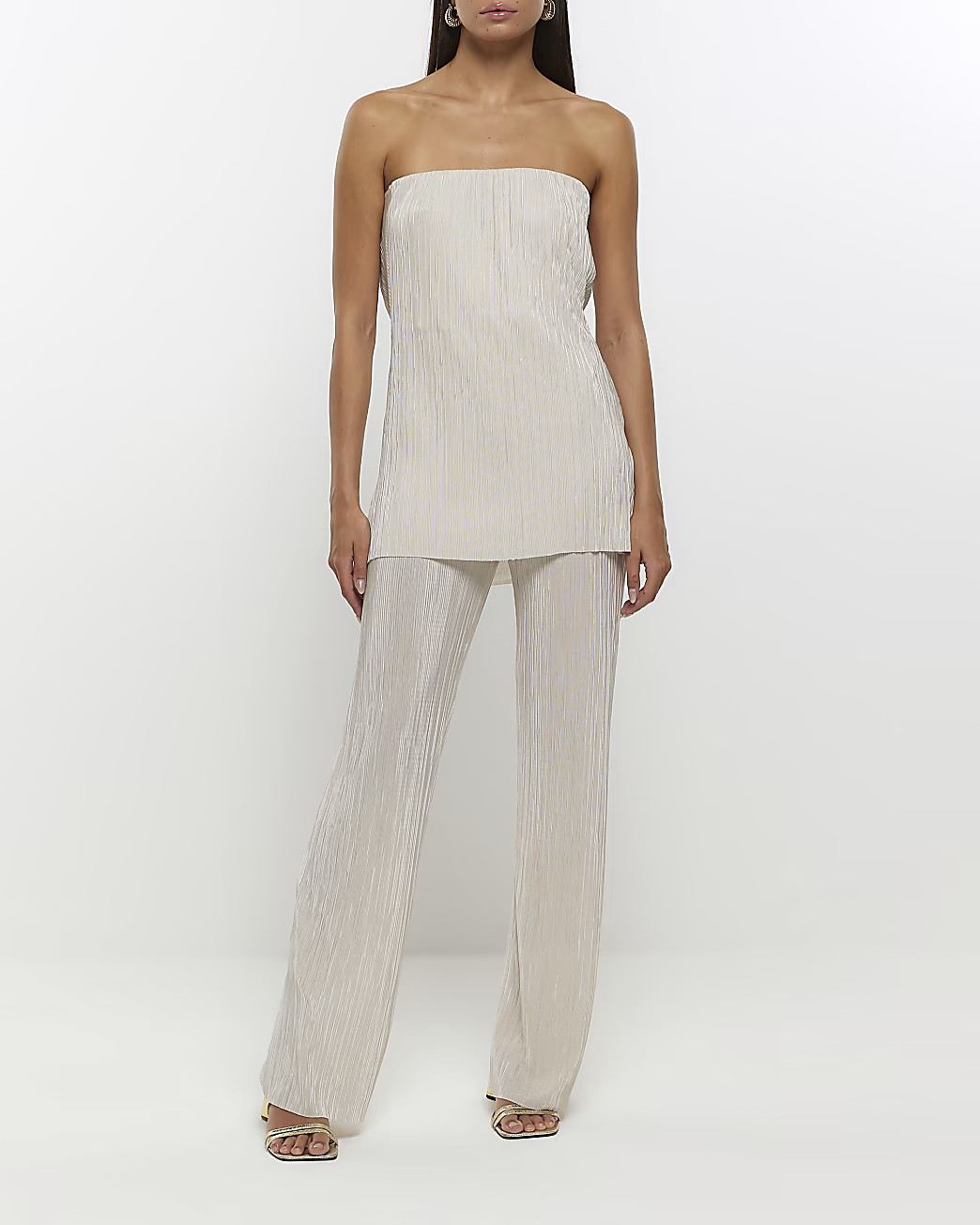 Cream plisse flared trousers | River Island (UK & IE)