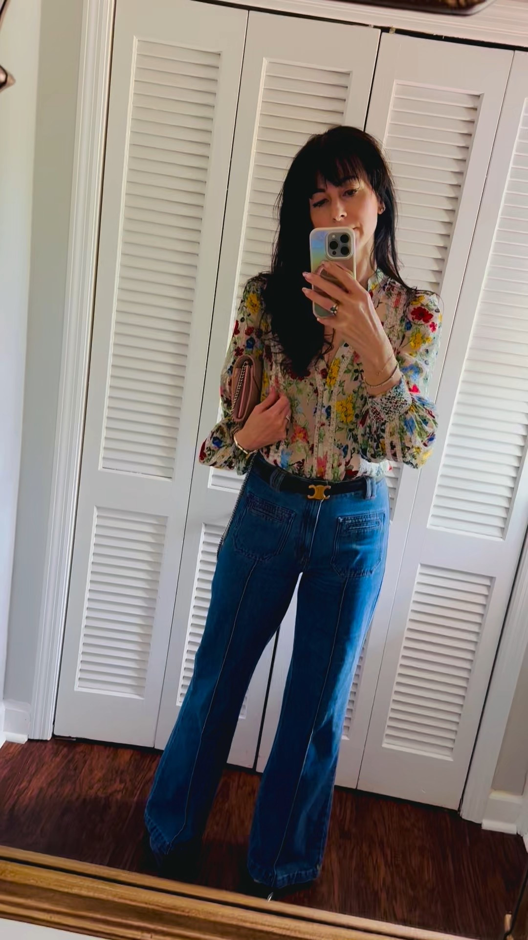 Loving this blouse from Alice & Olivia paired with wide leg denim from Sézane. My exact jeans are sold out but similar ones are linked below. #springstyle #ootd #florals #widelegdenim 

#LTKStyleTip