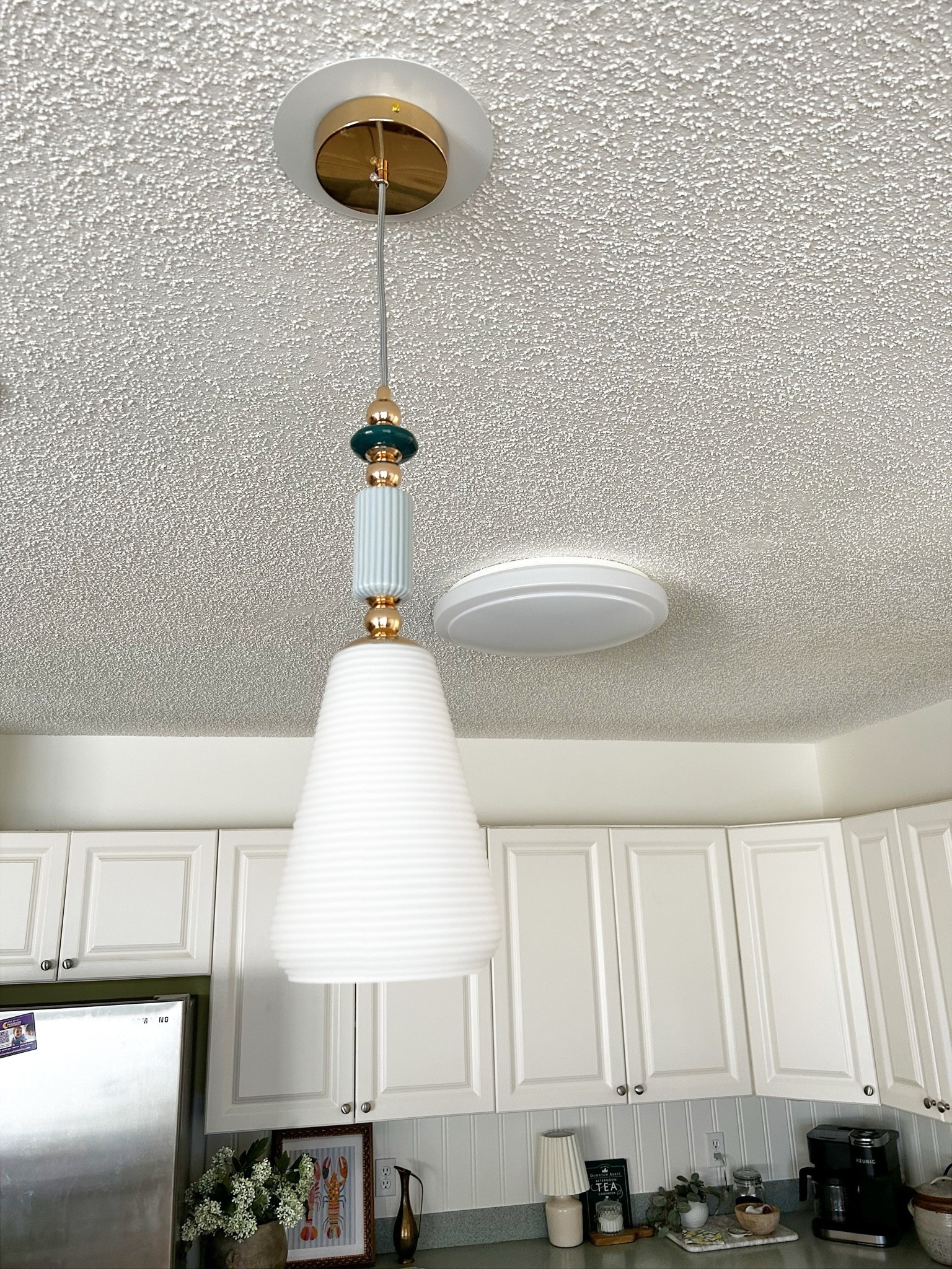 Just installed this pendant in our kitchen. We have 3 recessed lights that we wanted to convert to pendant lights. One down, 2 to go! Linking the converter kit as well.

#LTKdayinmylife #LTKHome #LTKvlog