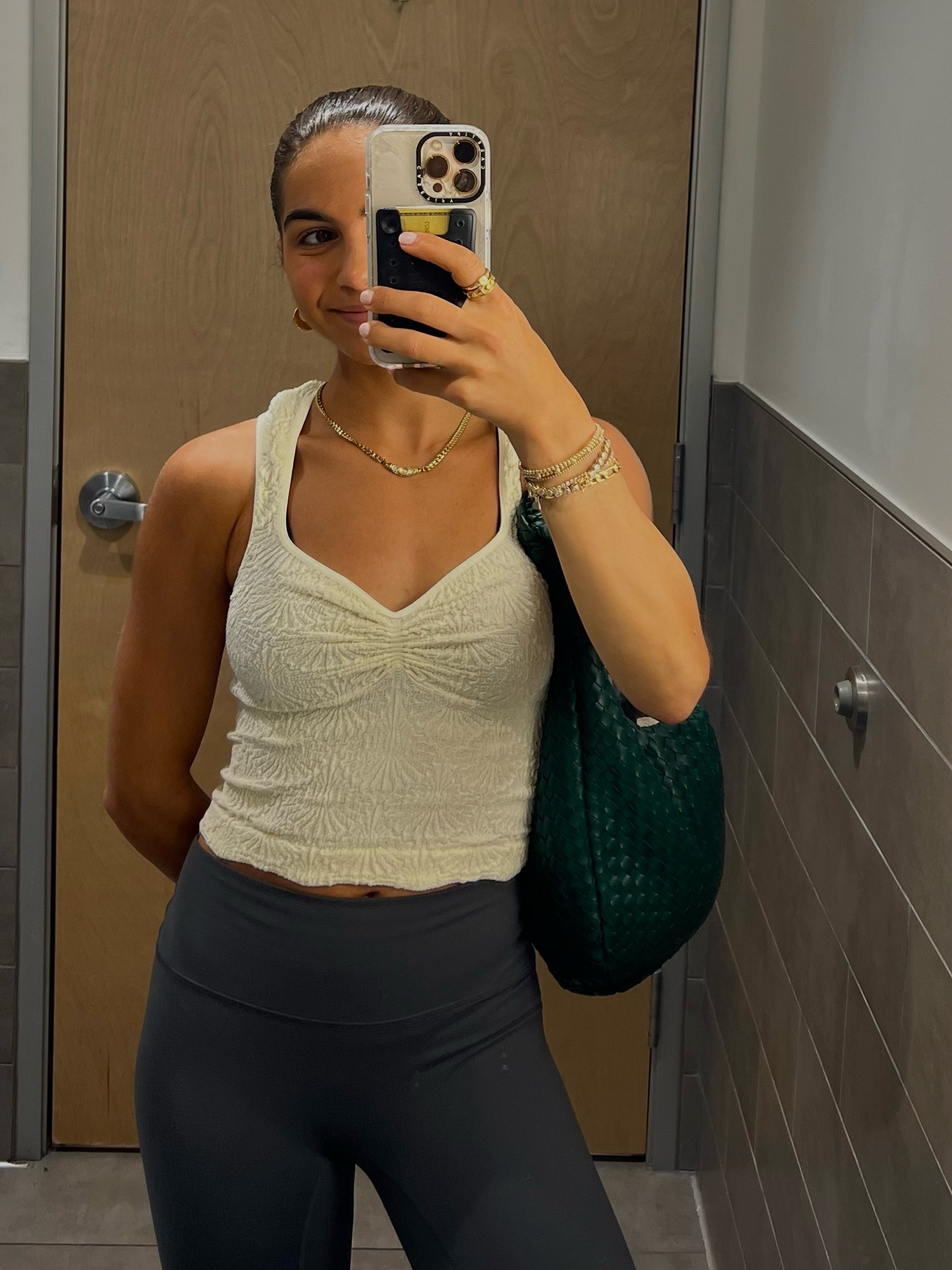 cream/off white scrunch tank! buttery material and elevates any outfit. so comfy and flattering too 