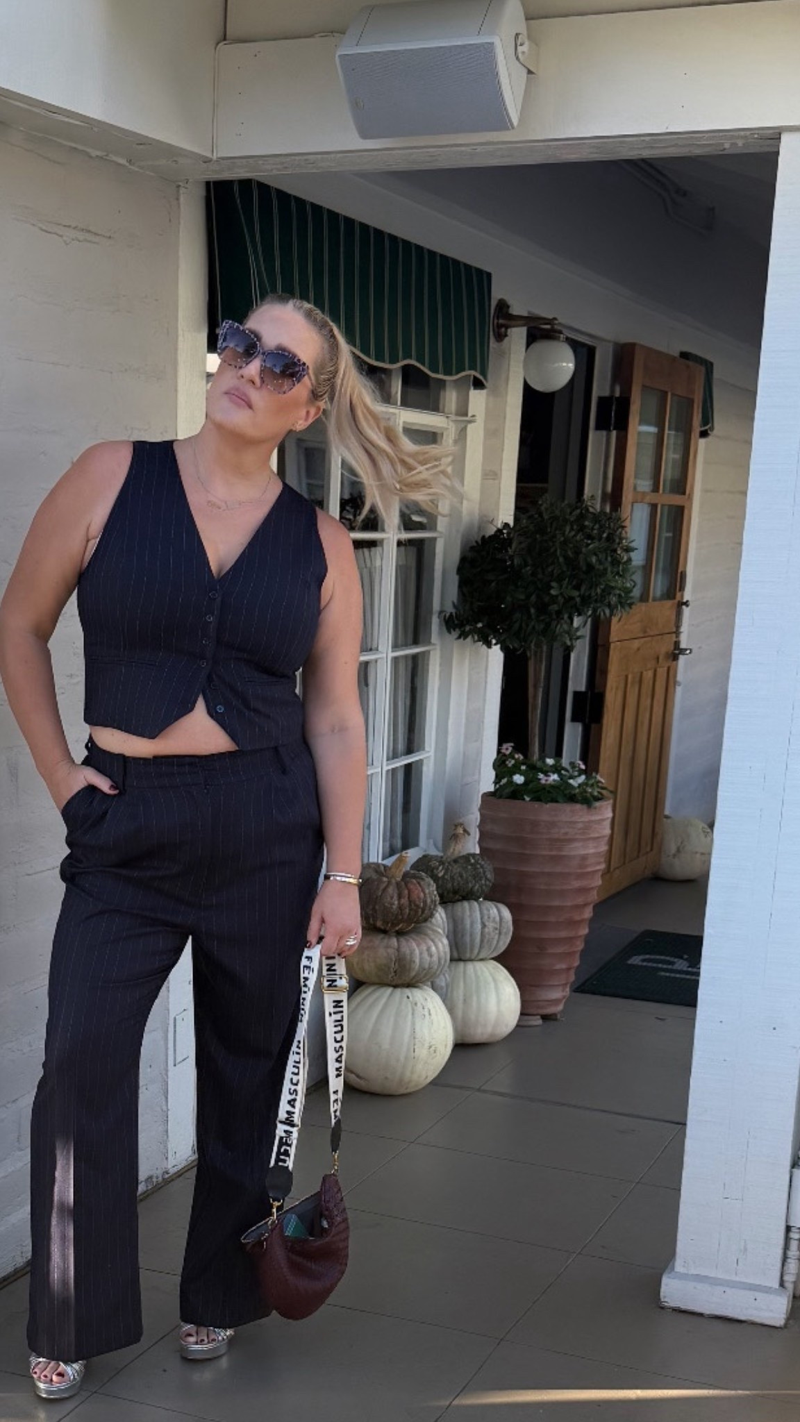A love a good pinstripe on a woman, especially when in the woman. @favoritedaughter #pinstripes #pinstripesuit #pantsuit #vest #trousers #workwear