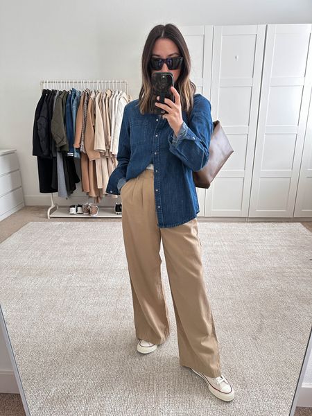 Lots of you looking for a shim shirt! This Sezane one is SO GOOD!  I went up a size, but exchanging for 2 sizes up. Going with the 38. The dark wash is stunning!

Sezane shirt 36 (4)
Madewell pants 00. Run big. 
Converse sneakers 5
Mansur Gavriel bag 
Celine sunglasses 

#LTKSeasonal #LTKshoecrush #LTKitbag