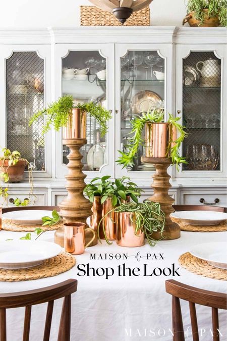 Copper mugs and tins with florals help create the mood for this spring table. Copper mugs, copper tins, chargers, spring table 

#LTKhome #LTKSeasonal