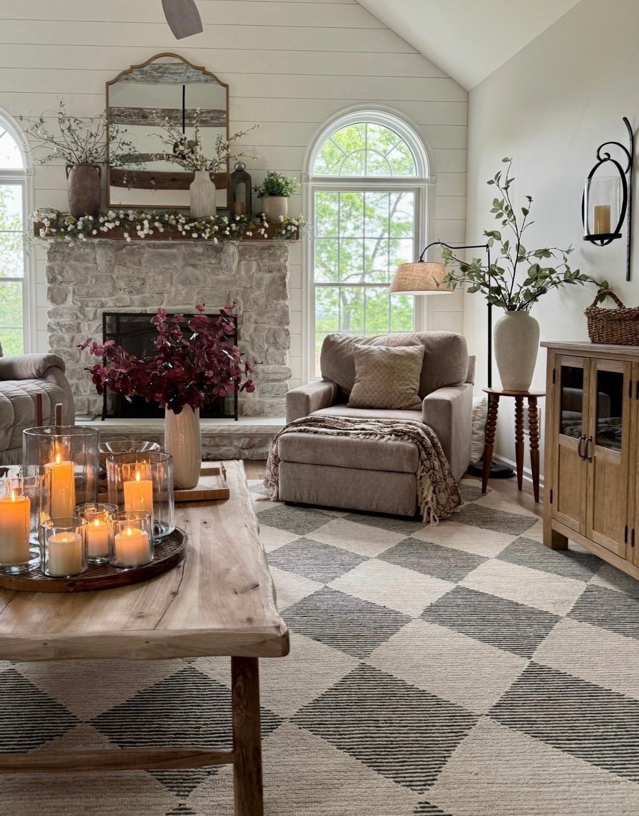 Lots of sales going on now on some of my faves! Curved arm floor lamp with linen shade is back in stock and on sale. Solid wood accent table and buffet table are both on sale now! Our custom made reclaimed wood coffee table is an all time favorite piece of furniture and sells at a really decent price point. Our best selling charcoal and beige geometric rug - certain sizes on sale. Glass hurricane candle holders in 3 sizes. My favorite tall sage green stems sold out last year. The very popular and beautiful cascading cream hops florals on top of fireplace, handcrafted metal lantern is back in stock. The best burning wax pillar candles and brown vintage floral throw. Neutral accent chair from Best Home Furnishings. 

#LTKHome #LTKSaleAlert