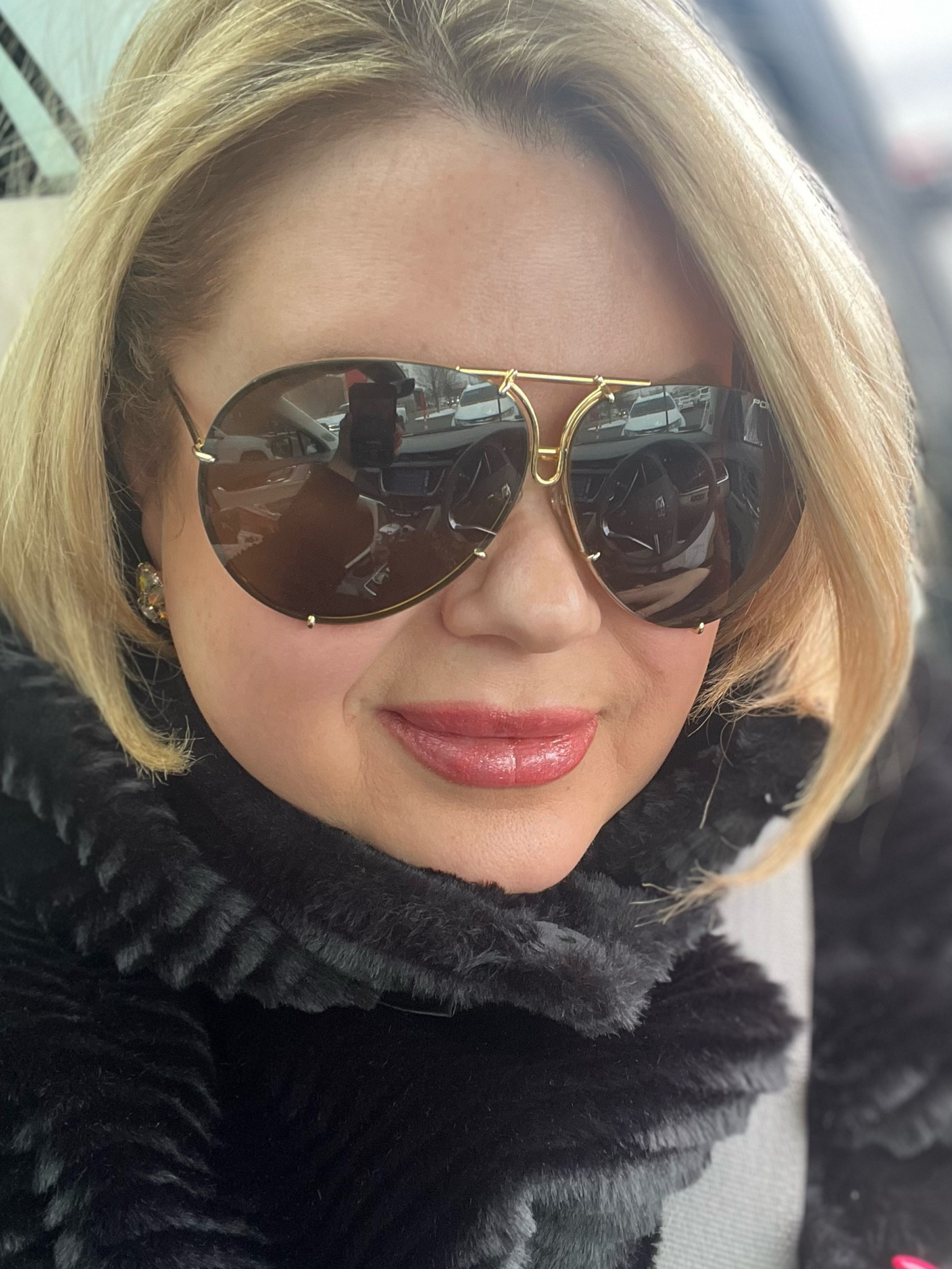 Porsche aviator sunnies have been my fav for quite sometime now. I have on the largest size available in 69. 
I love that you can swap out the lenses  